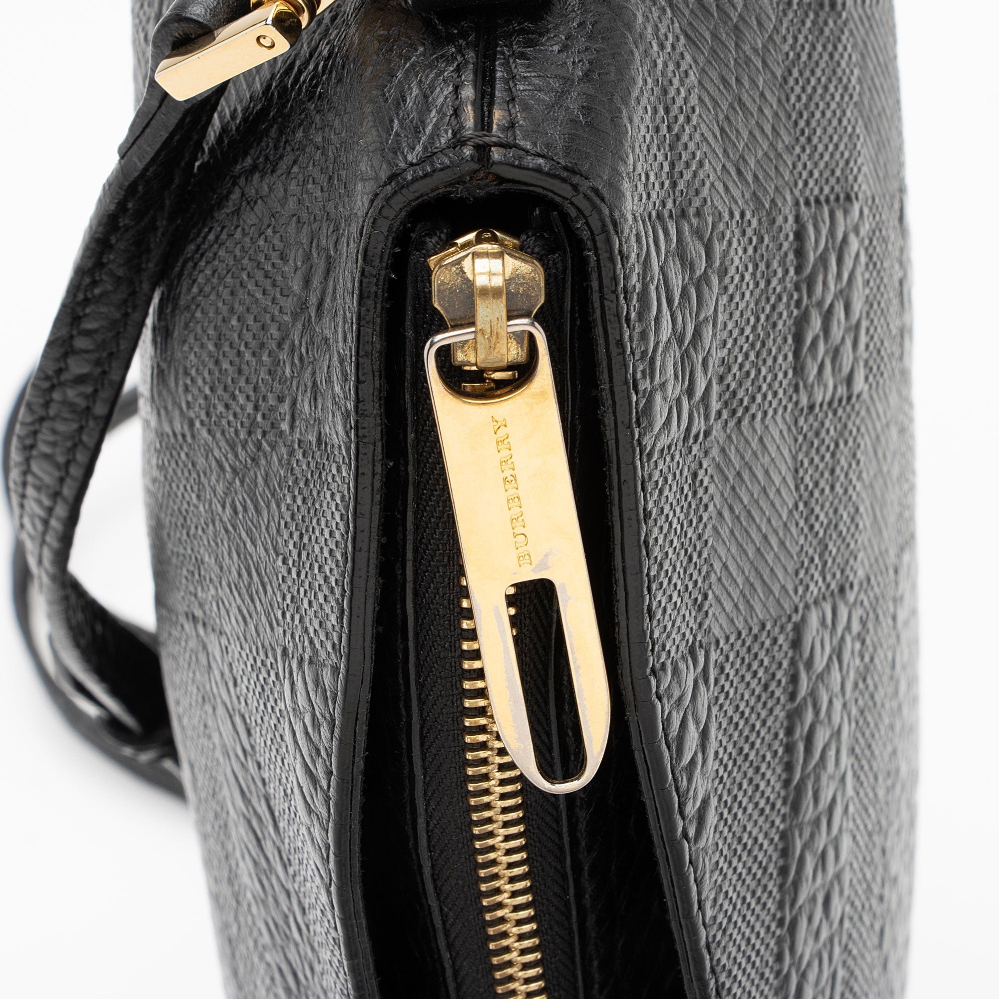 Burberry Leather Embossed Check Chichester Clutch (SHF-TC4VkJ)