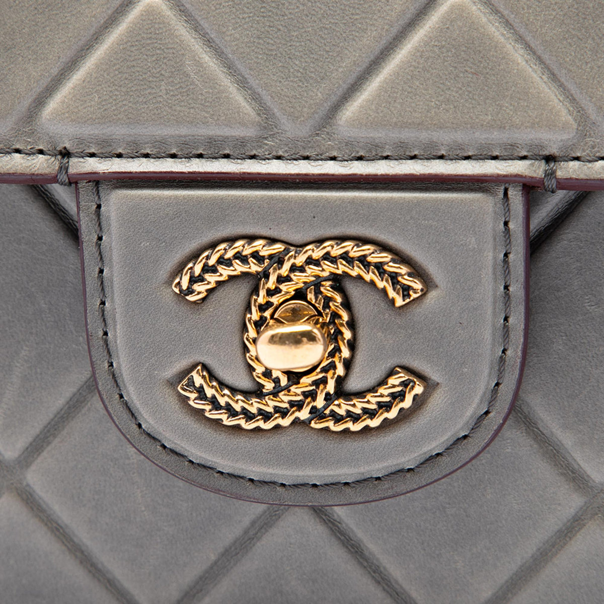 Chanel CC Quilted Debossed Calfskin Flap