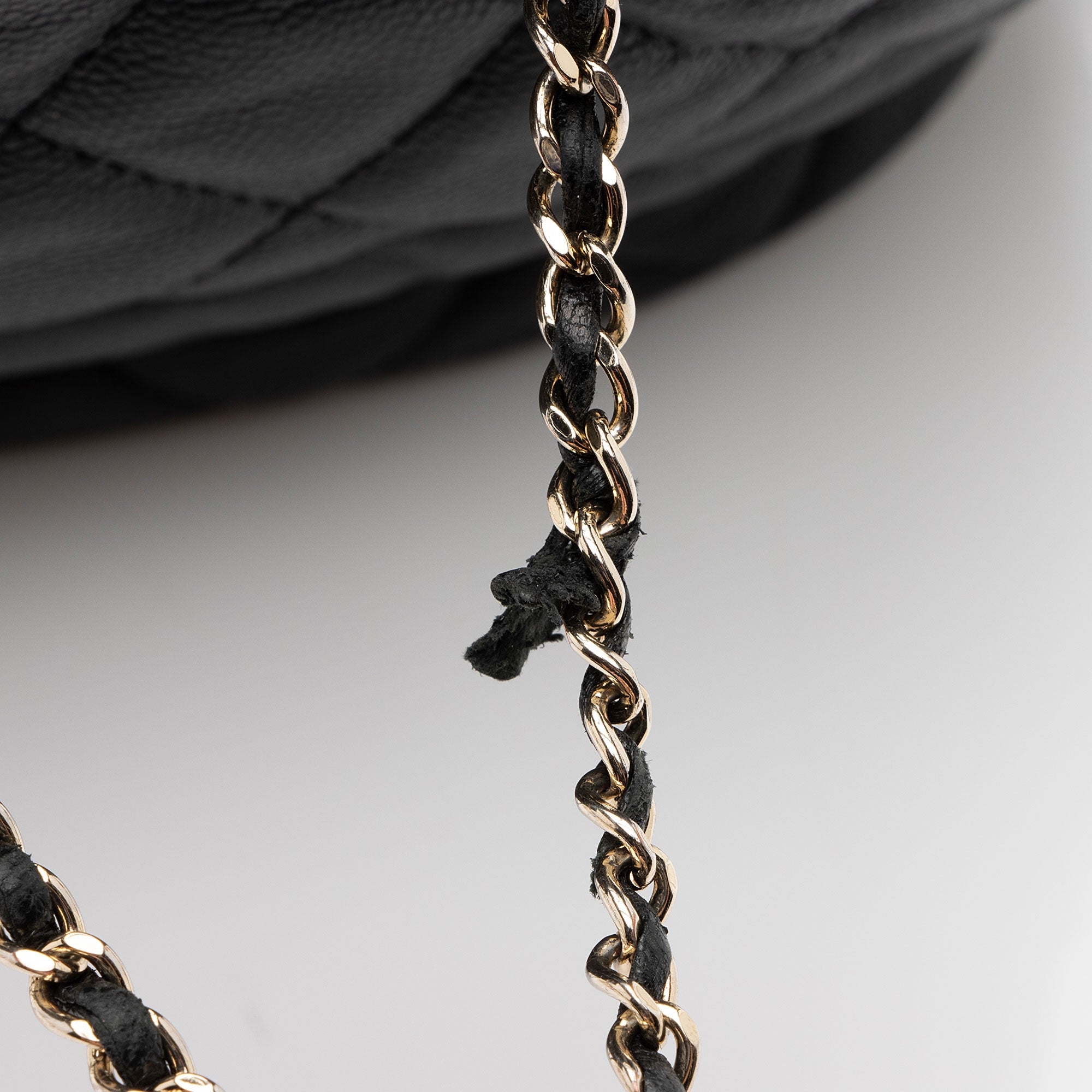 Chanel Caviar Leather Rolled Up Drawstring Bucket Bag (SHF-9VaoLU)