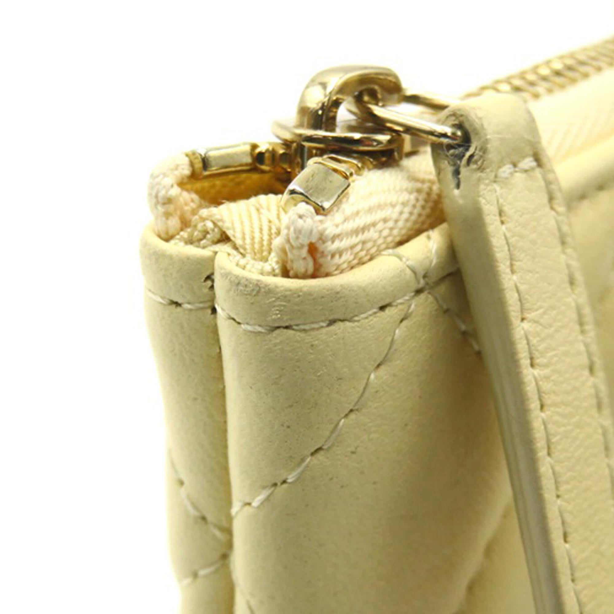 Chanel Lambskin Mini O Case Pouch (SHG-ubGuHV)