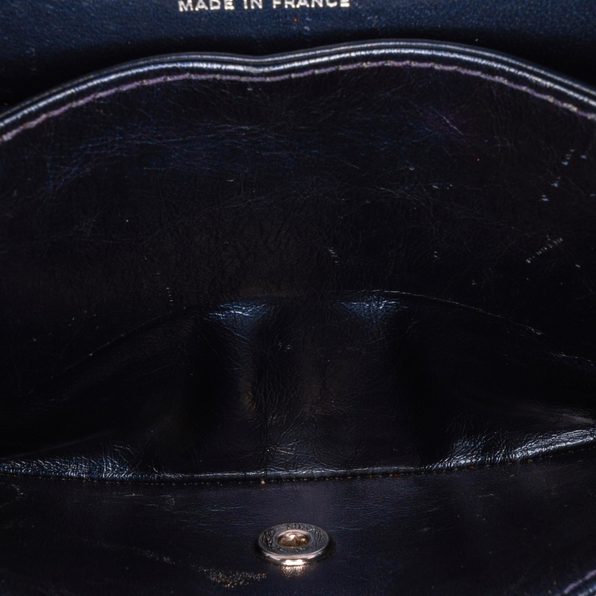 Chanel Medium Studded Leather Airlines Double Flap (SHG-MHpqyU)