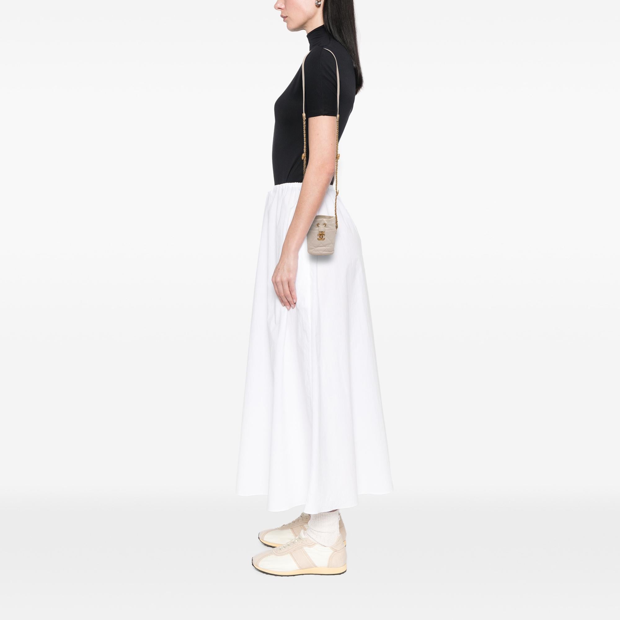 Chanel Mini Quilted Caviar Twist Your Buttons Drawstring Bucket Bag