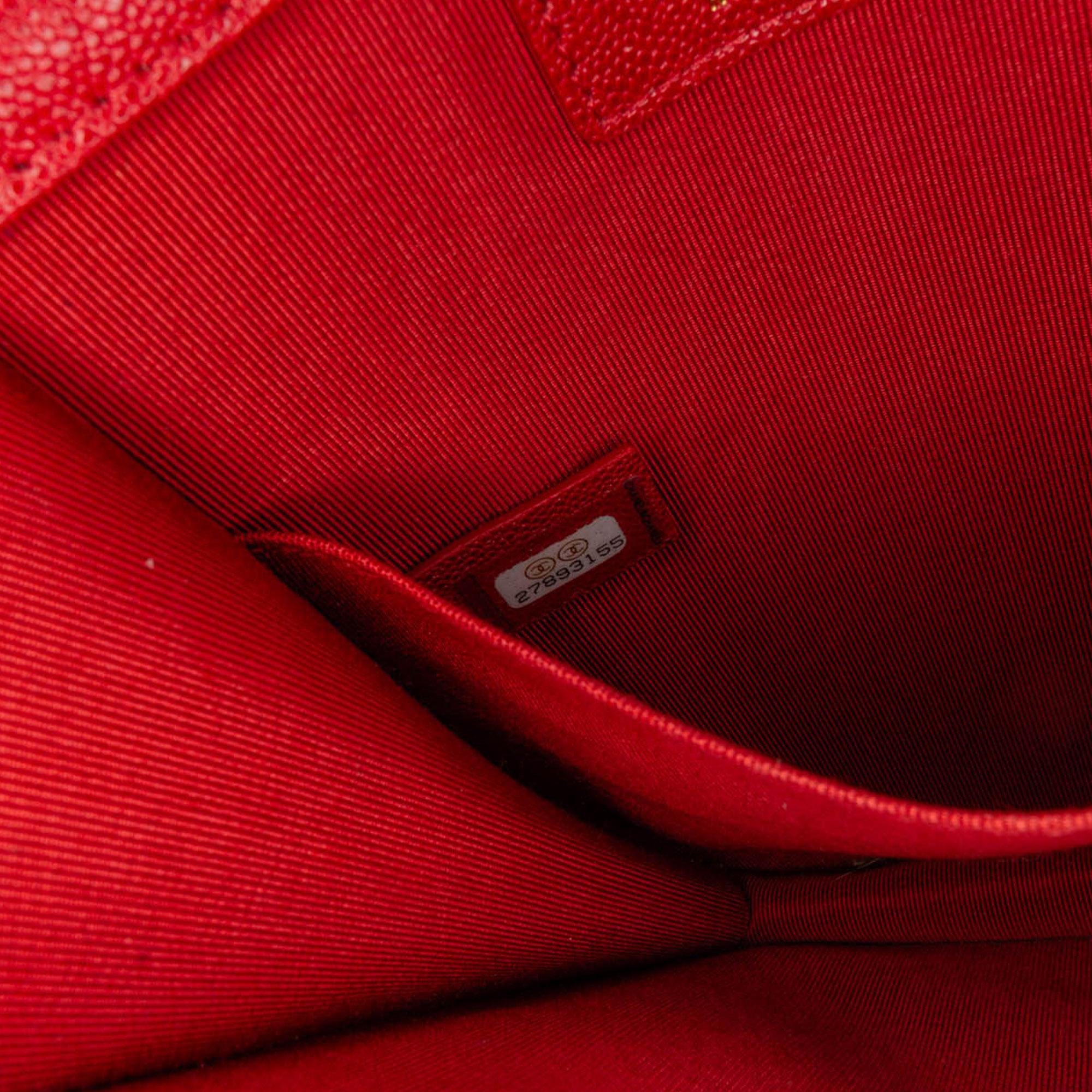 Chanel Quilted Caviar North South Boy Flap