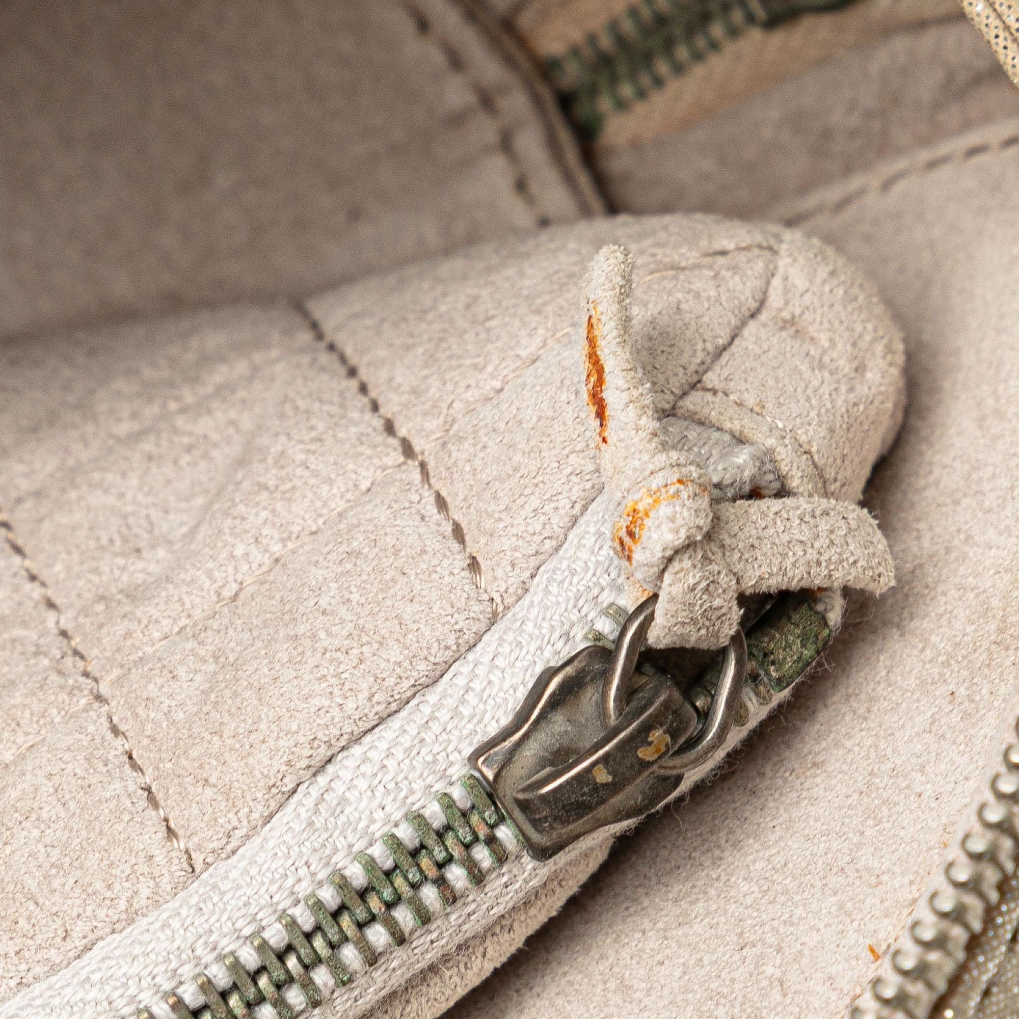 Chanel Quilted Iridescent Lambskin Wristlet Clutch