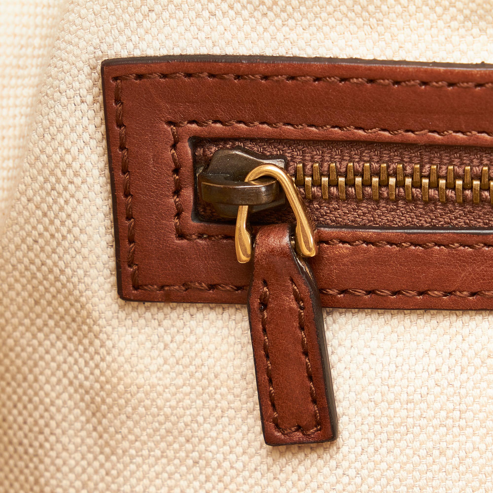 Gucci GG Canvas Stirrup Handbag (SHG-4H8XJO)