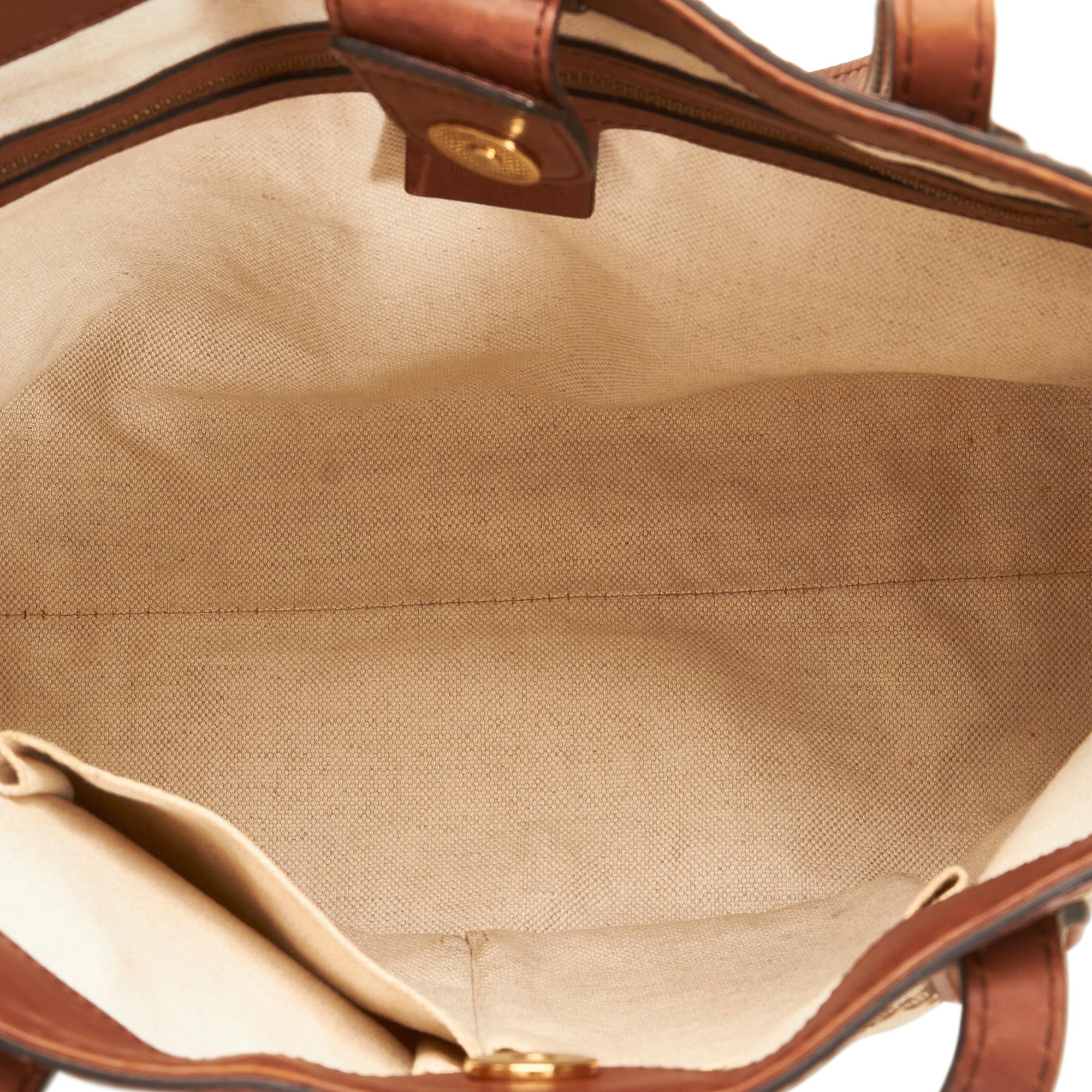 Gucci GG Canvas Stirrup Handbag (SHG-4H8XJO)