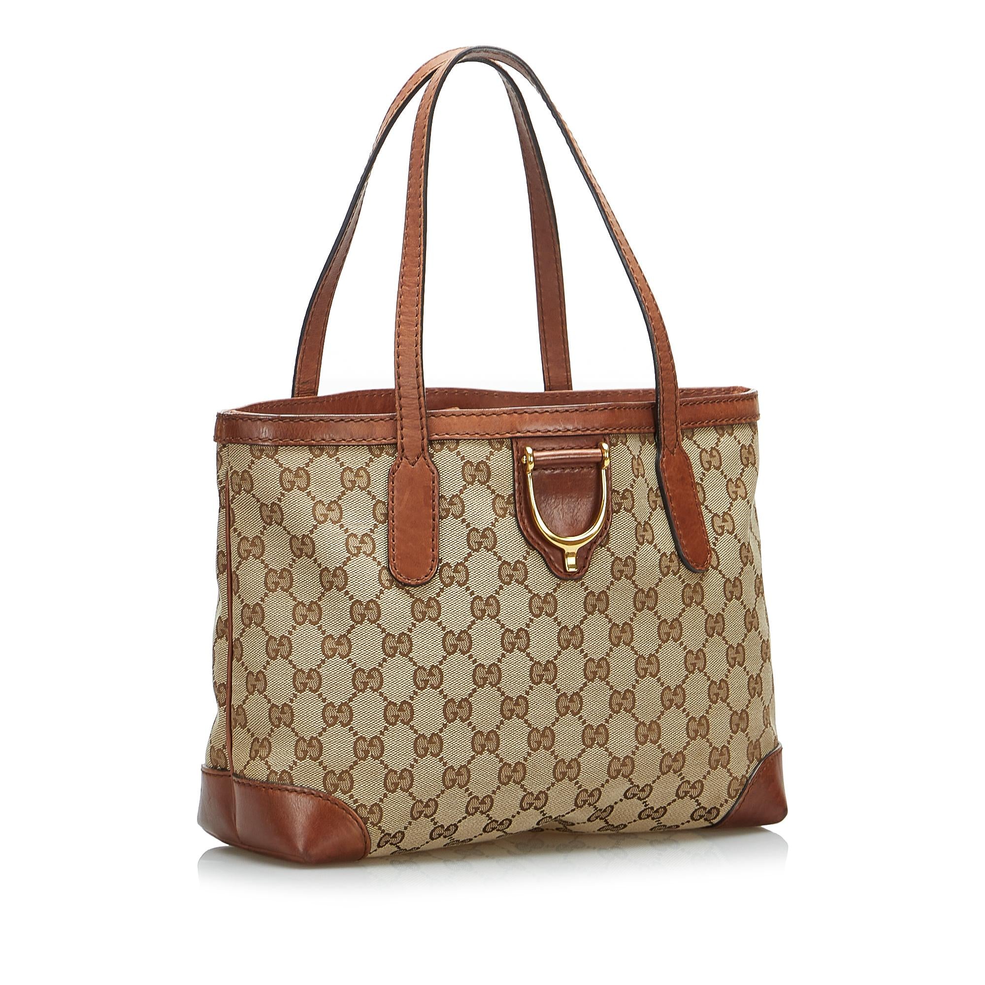 Gucci GG Canvas Stirrup Handbag (SHG-4H8XJO)
