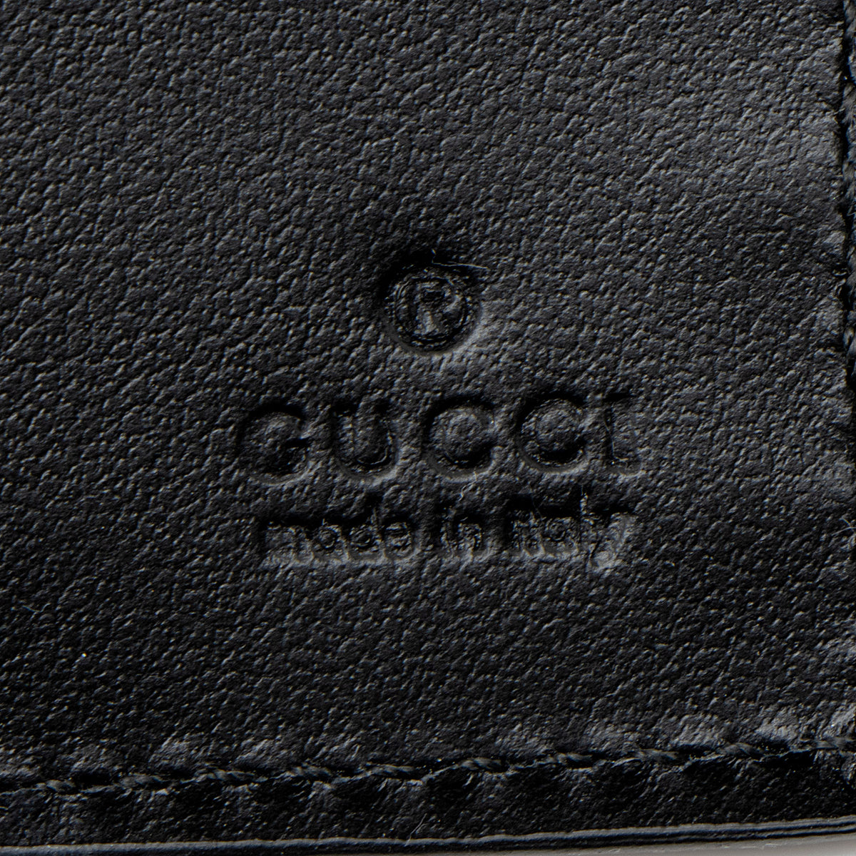 Gucci GG Embossed Silver Bifold Wallet