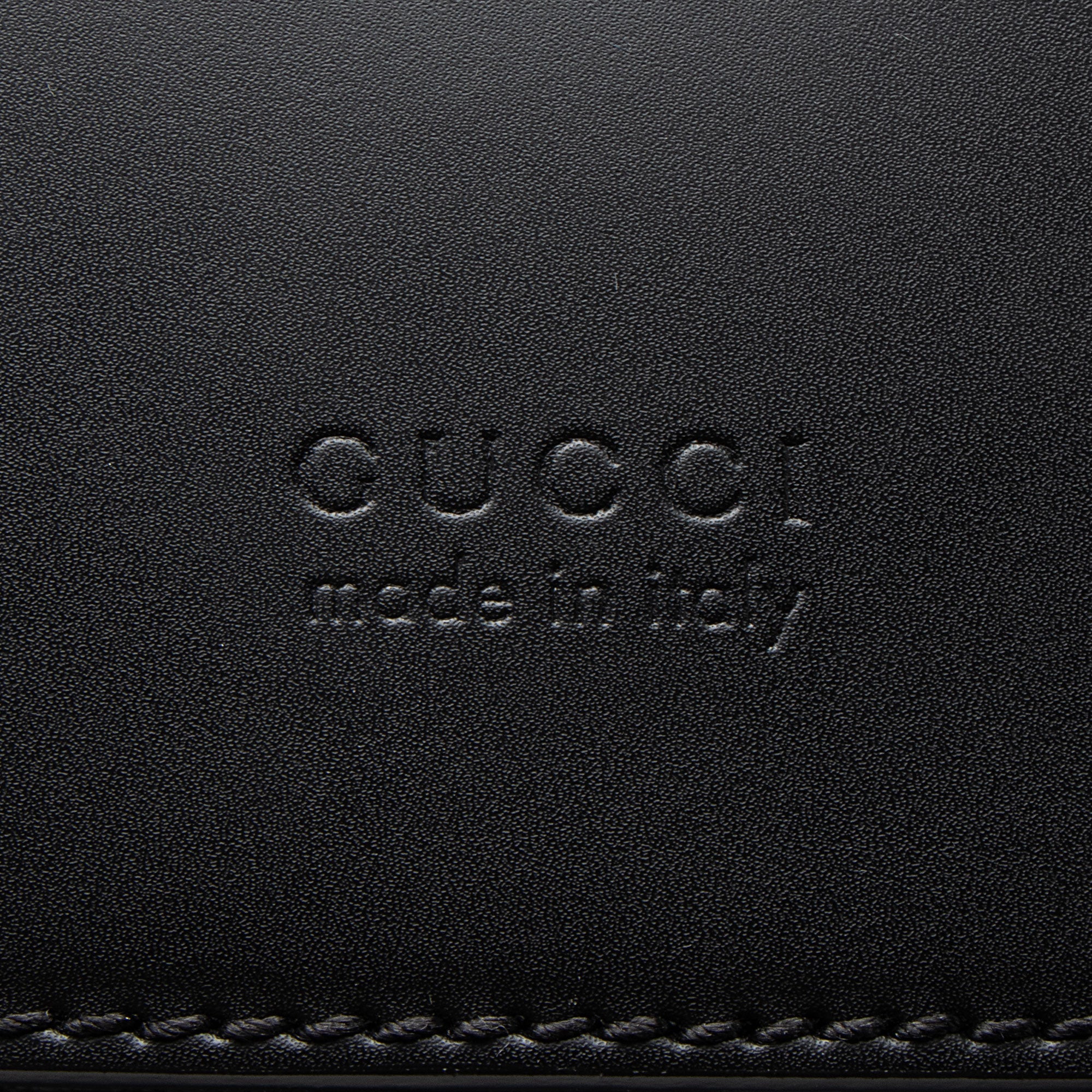 Gucci GG Supreme Medium Flap Backpack