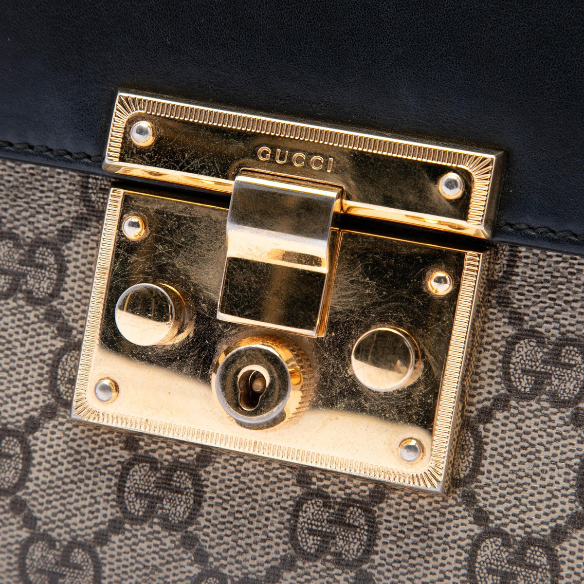 Gucci GG Supreme Padlock Clutch
