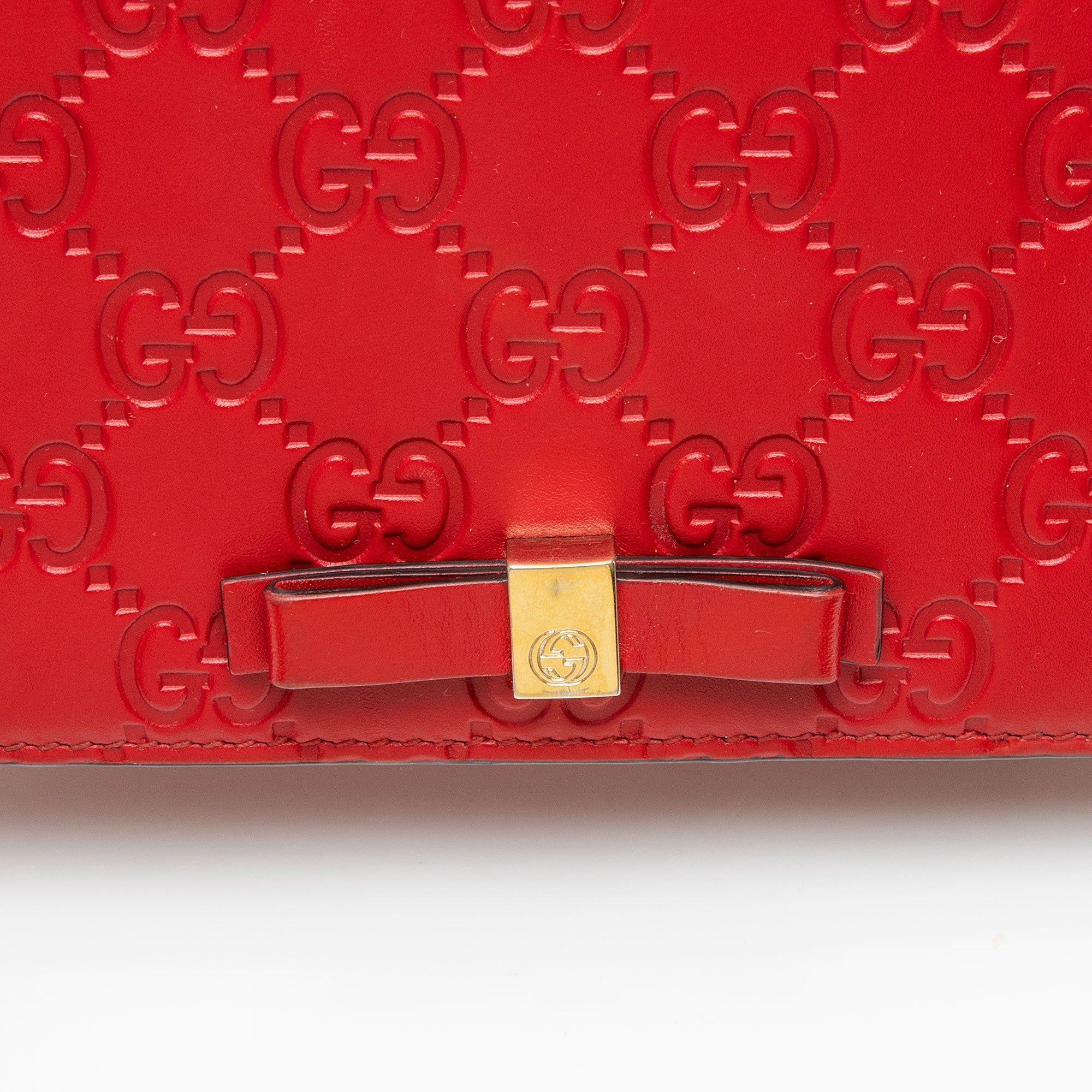 Gucci Guccissima Leather Signature Bow Mini Wallet on Chain