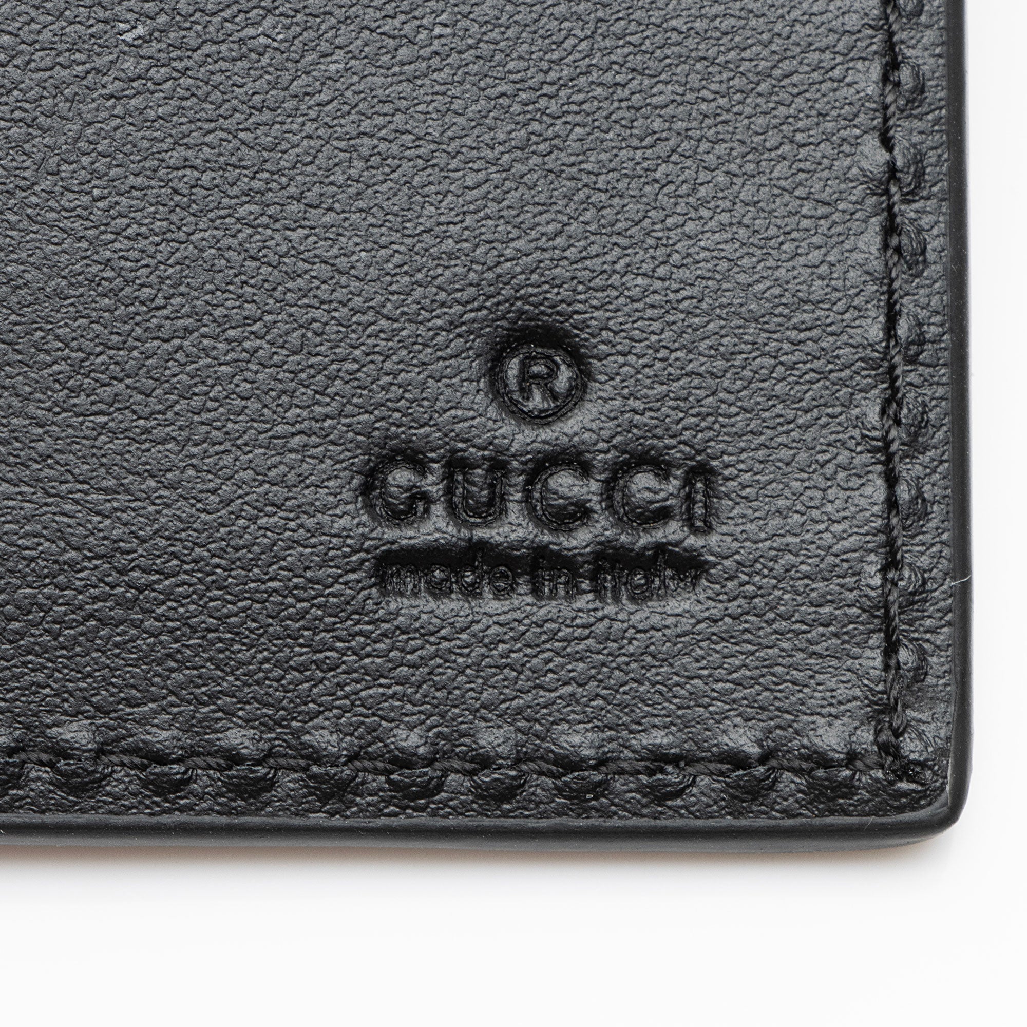 Gucci Jumbo GG Embossed Leather Bifold Wallet
