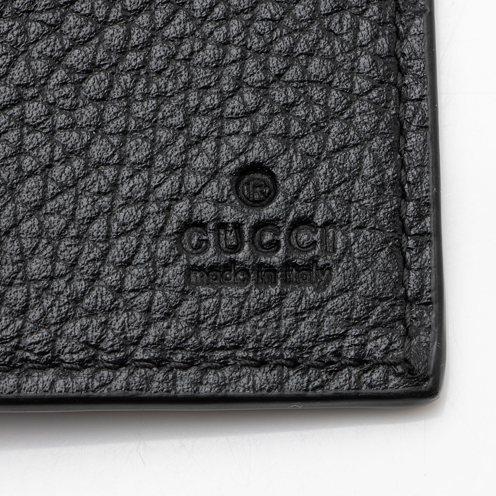 Gucci Jumbo GG Embossed Leather Bifold Wallet
