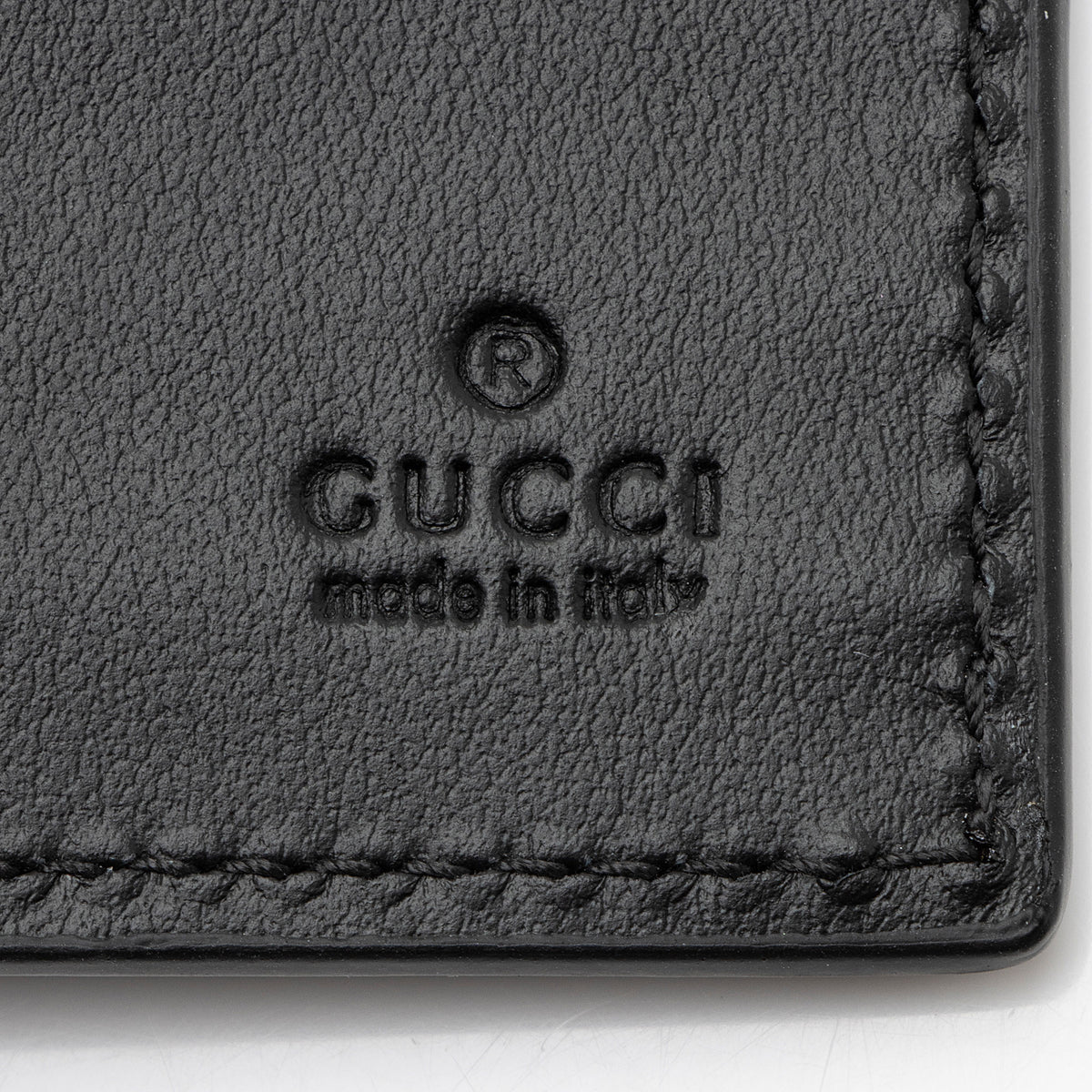 Gucci Jumbo GG Embossed Leather Bifold Wallet