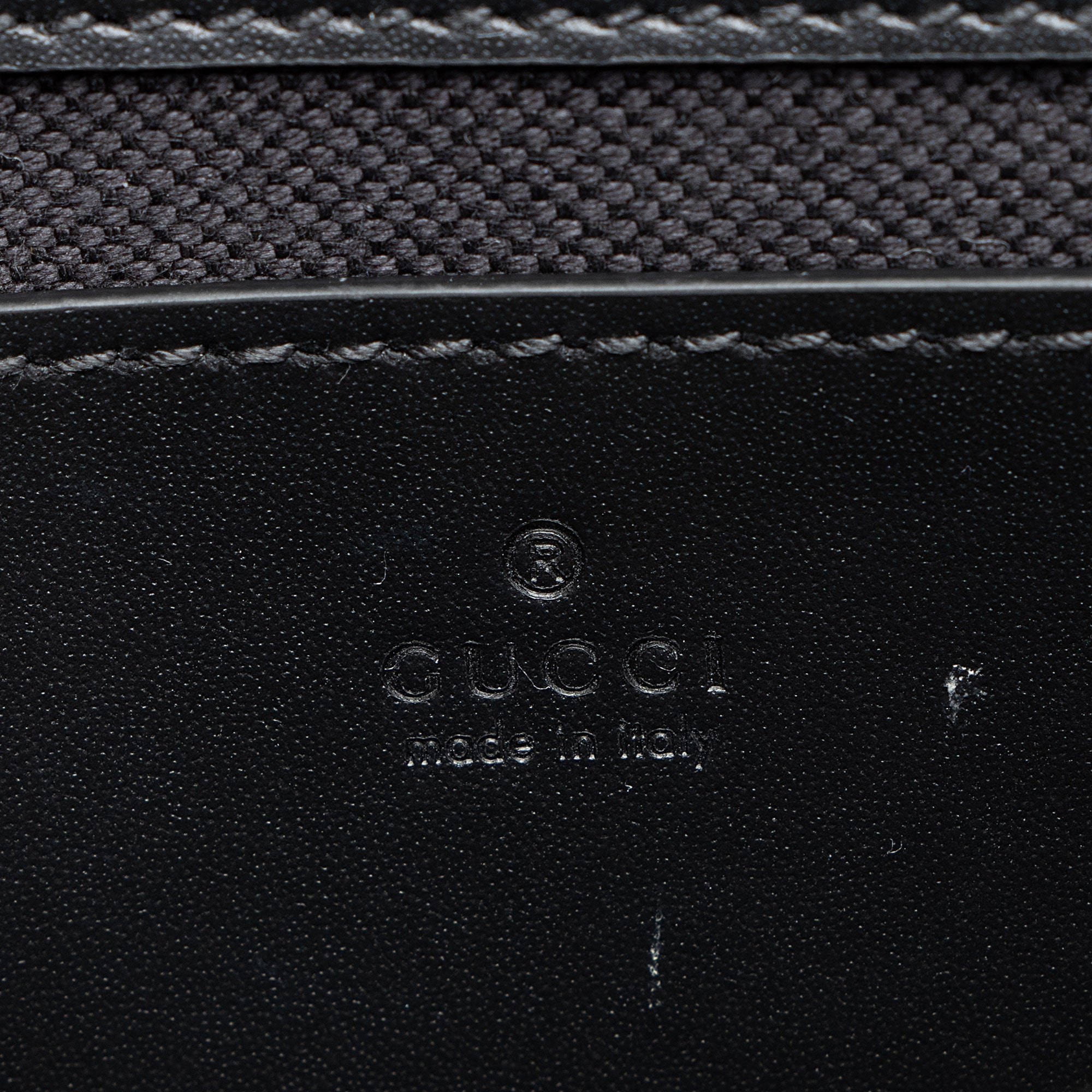 Gucci Jumbo GG Leather Mini Pochette