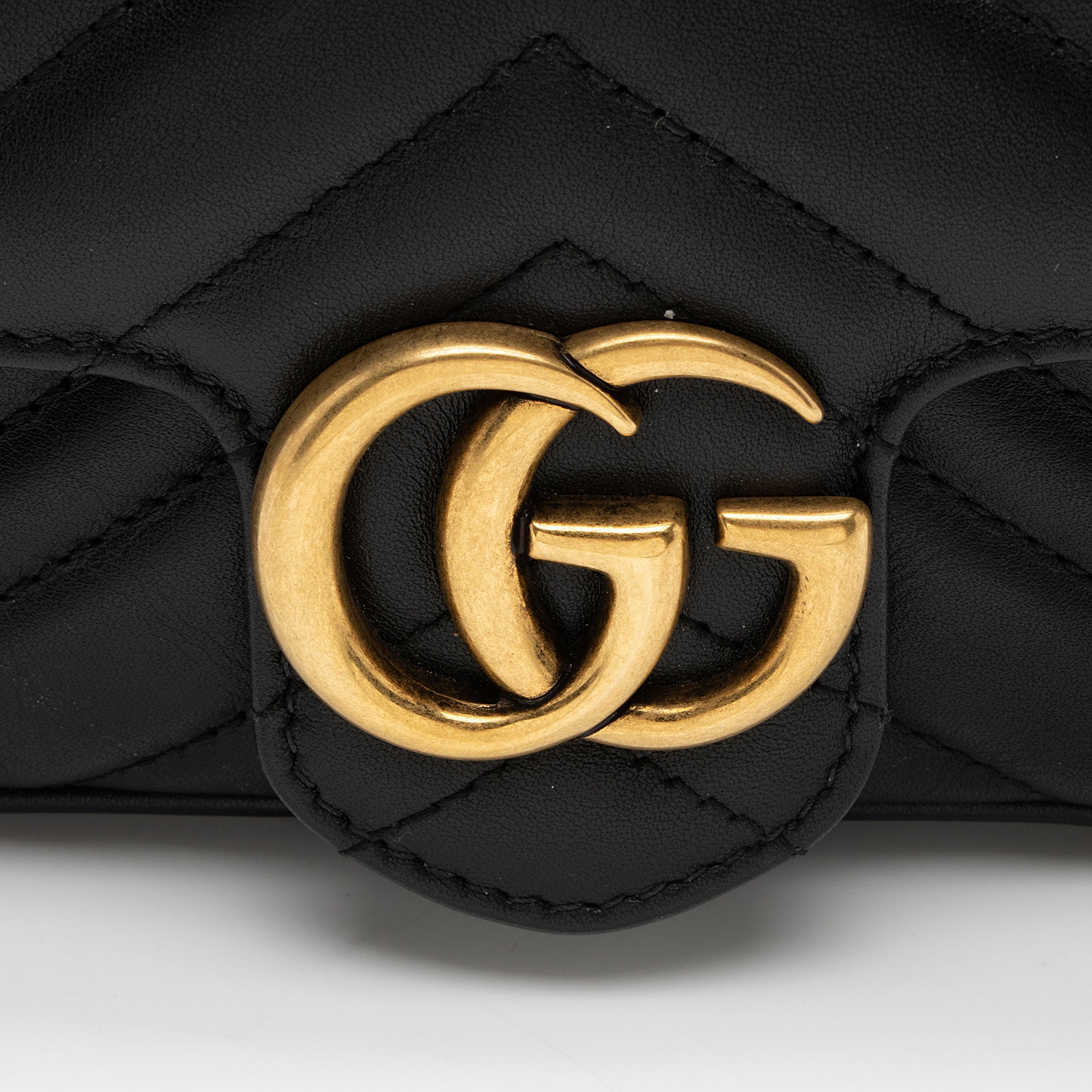 Gucci Matelasse Leather GG Marmont Super Mini Flap Bag (SHF-fWvNlT)