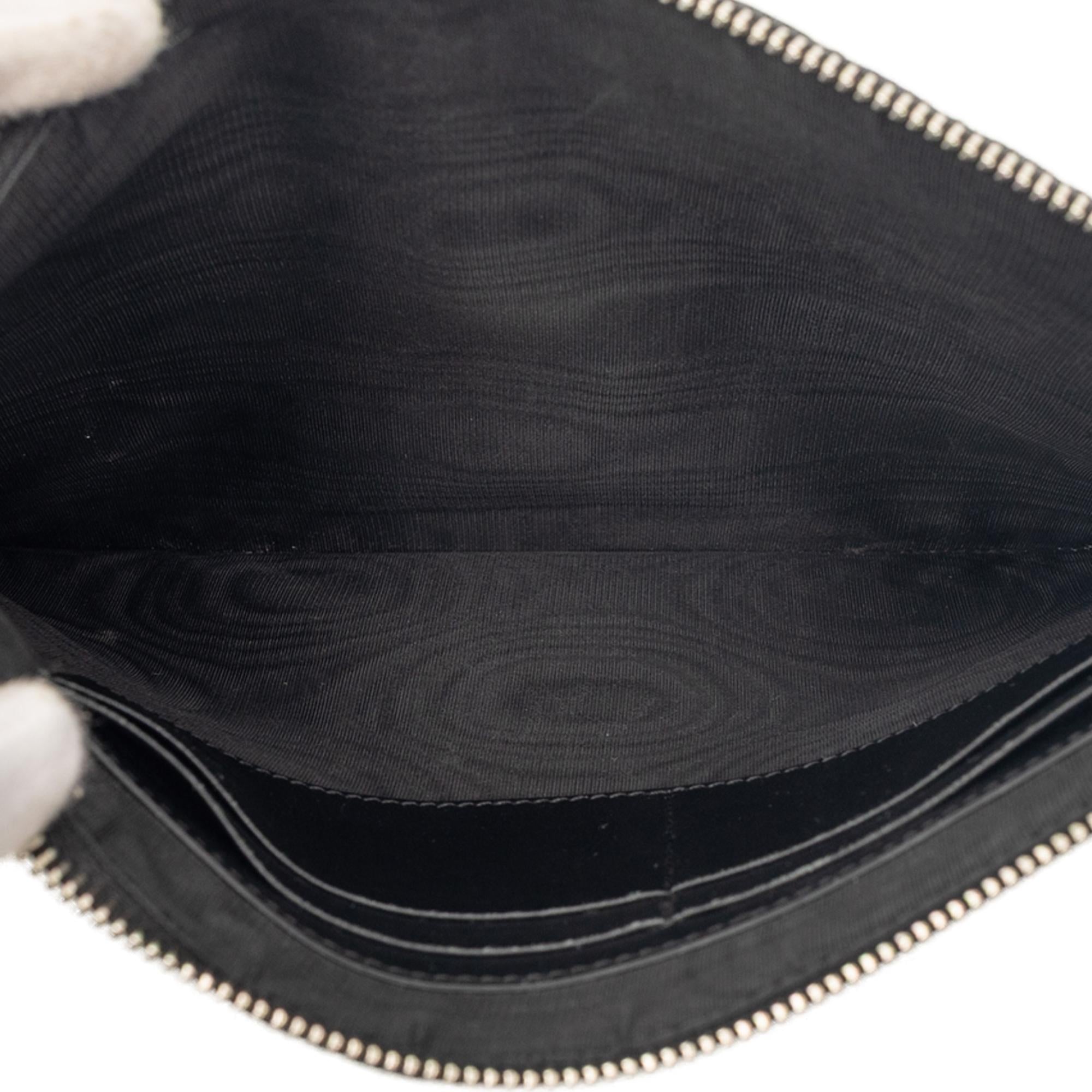 Gucci Microguccissima Clutch