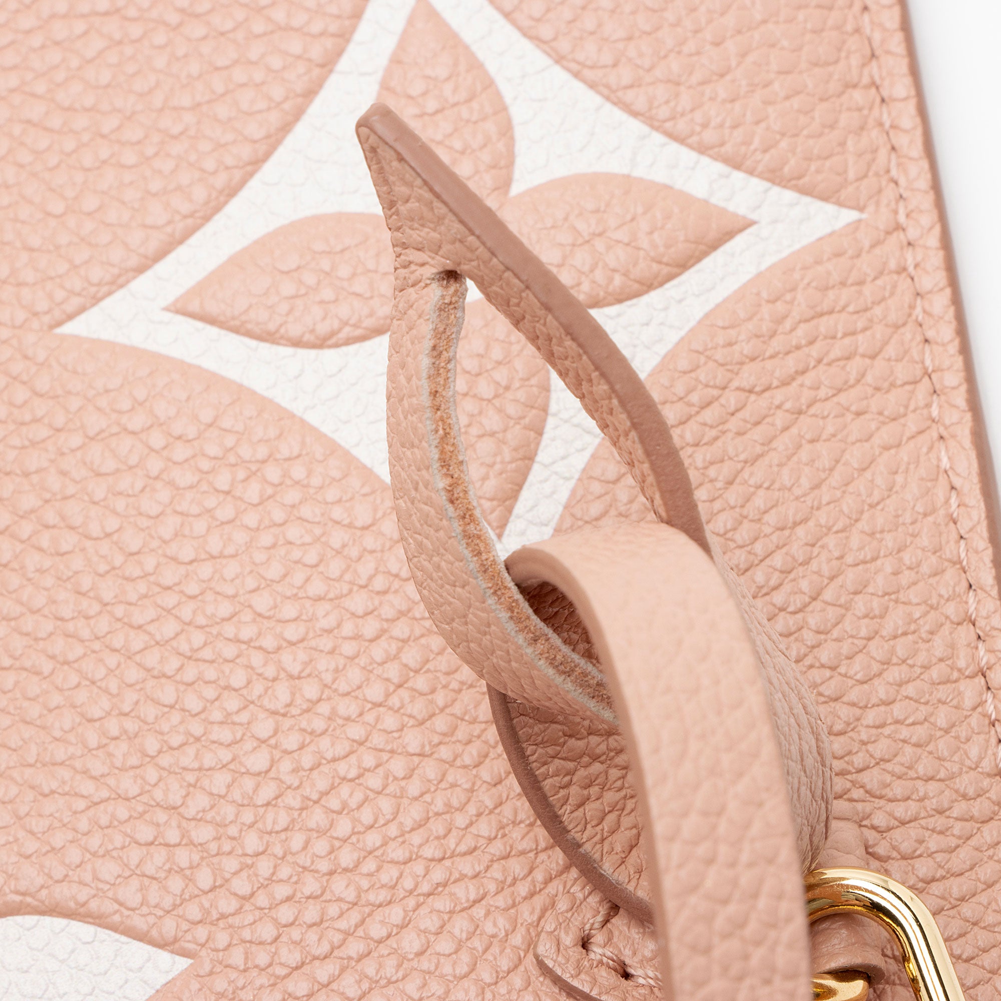 Louis Vuiiton Giant Monogram Empreinte Bicolor Neverfull MM Pochette
