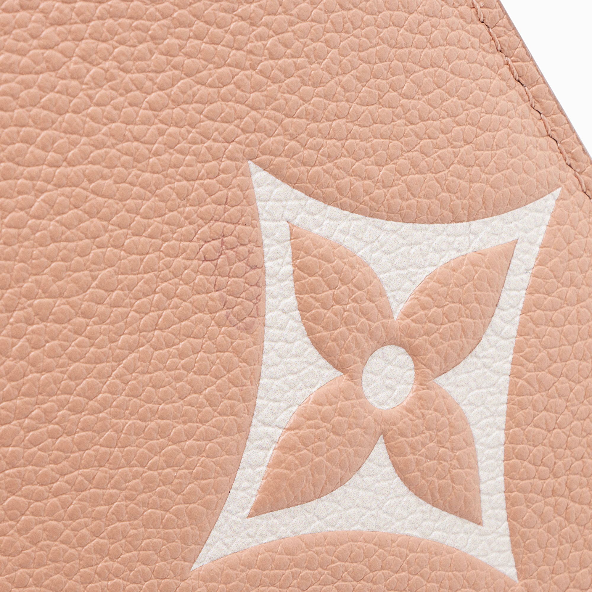 Louis Vuiiton Giant Monogram Empreinte Bicolor Neverfull MM Pochette