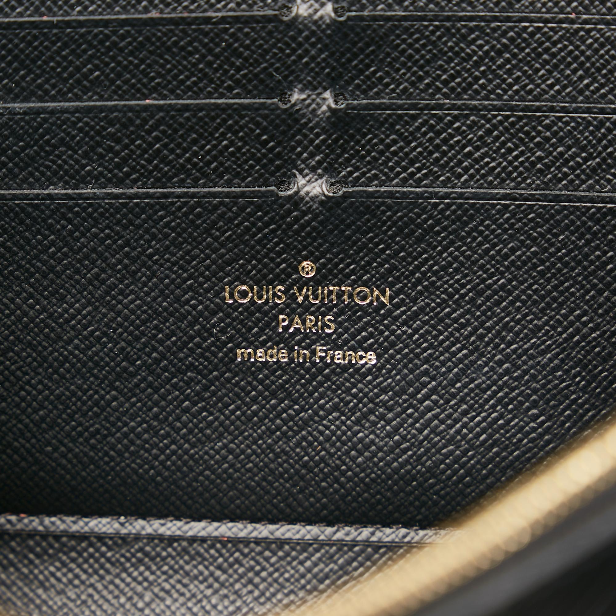 Louis Vuitton Epi Twist Love Lock Chain Wallet (SHG-MmYcl0)