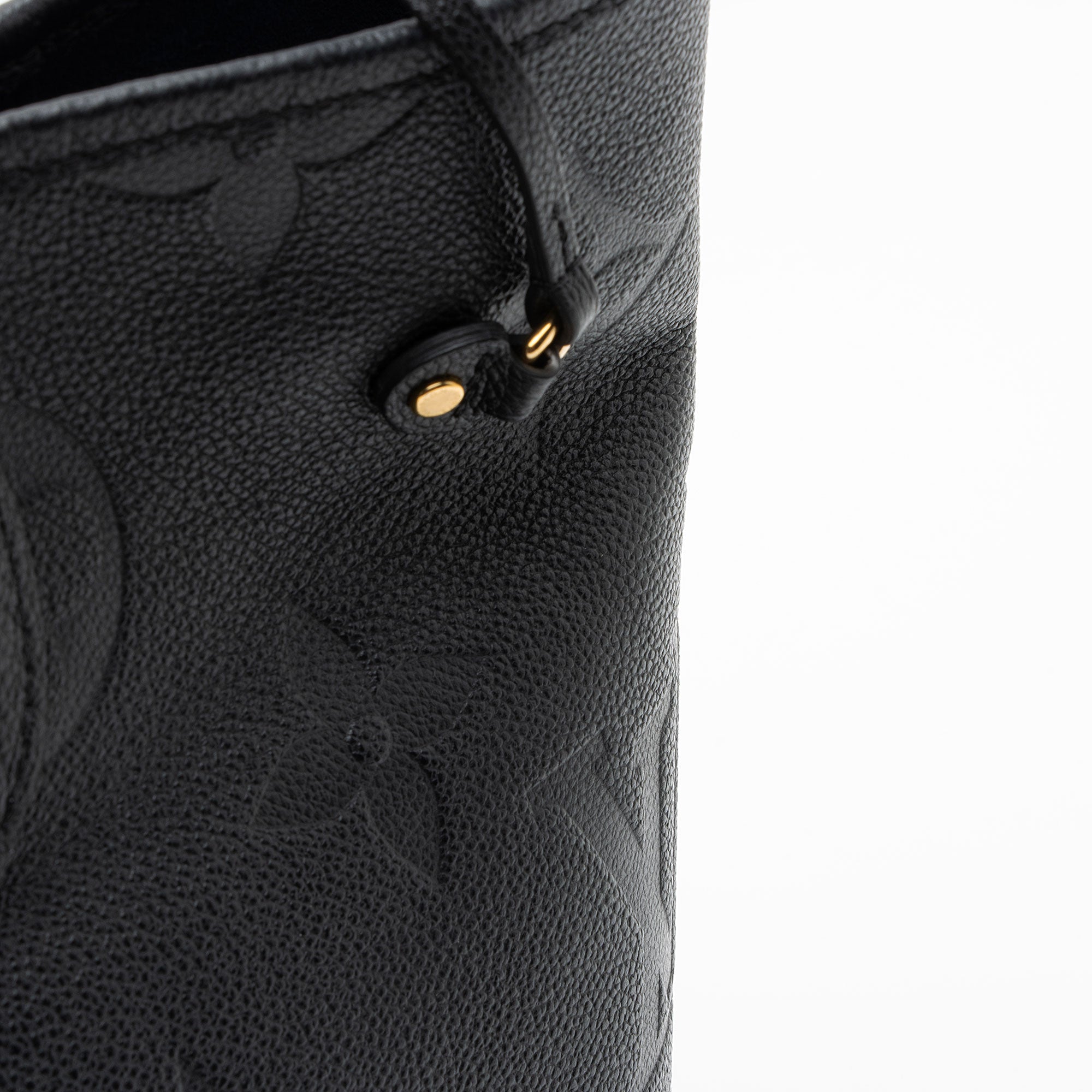 Louis Vuitton Giant Monogram Empreinte Neverfull MM Tote