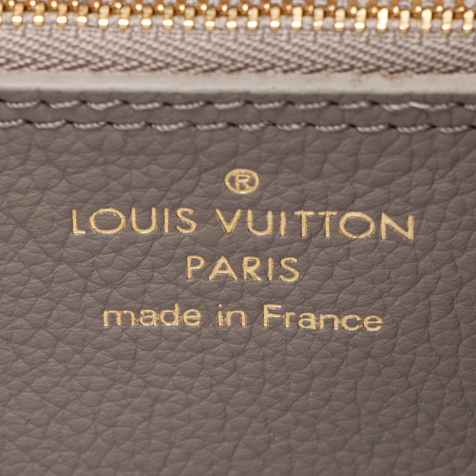 Louis Vuitton Mahina Leather Flight Mode Carmel Hobo