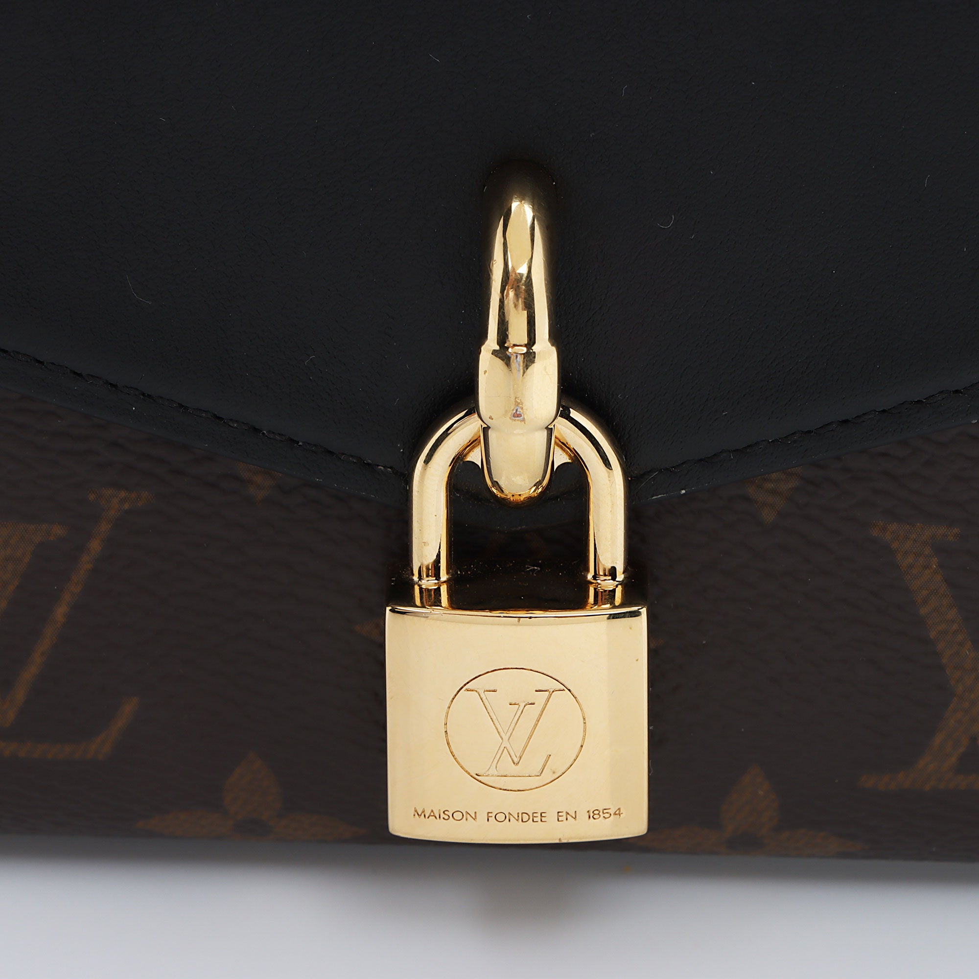 Louis Vuitton Monogram Canvas Padlock on Strap (SHF-Ss2gOb)