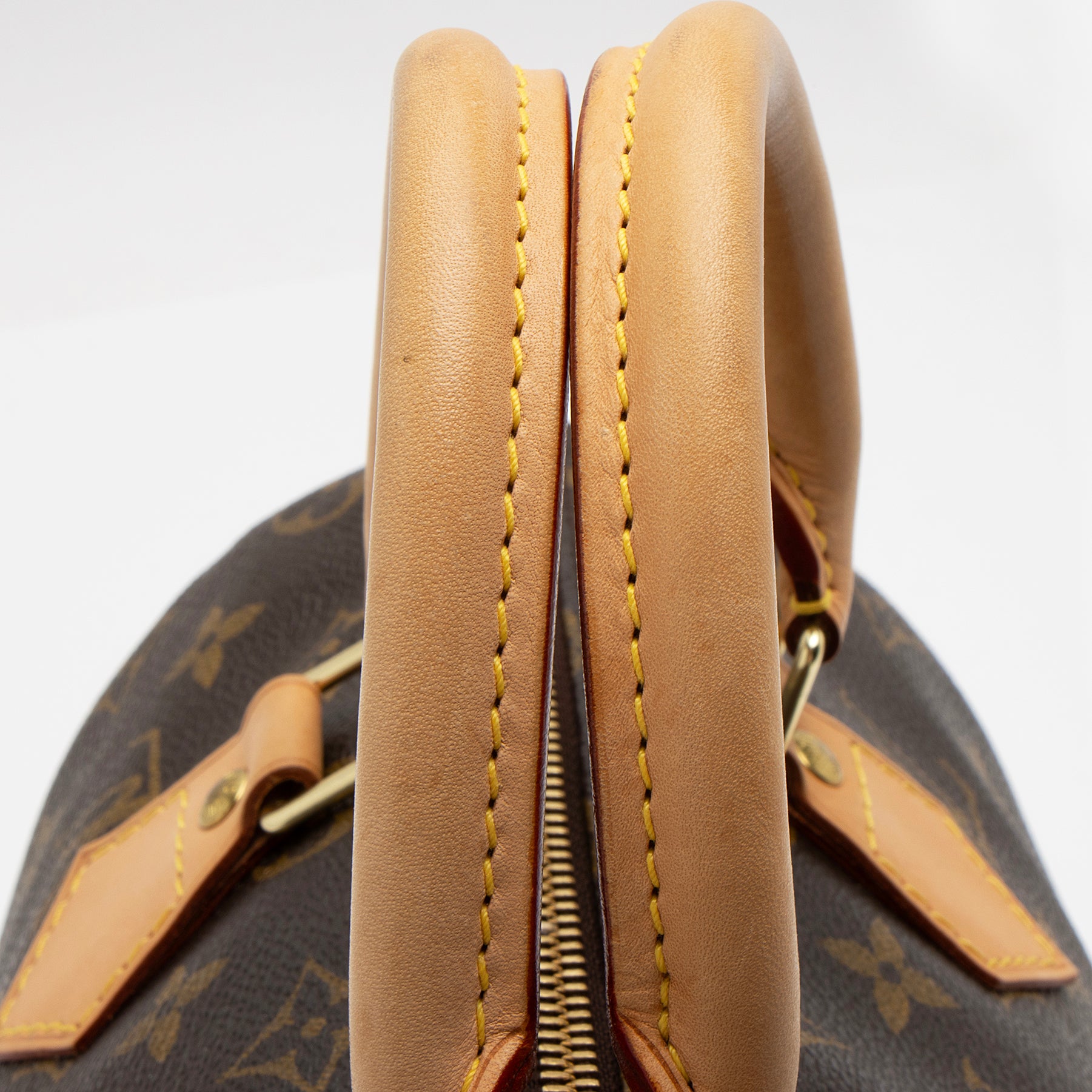 Louis Vuitton Monogram Canvas Speedy 25 Satchel (SHF-zlhtW7)