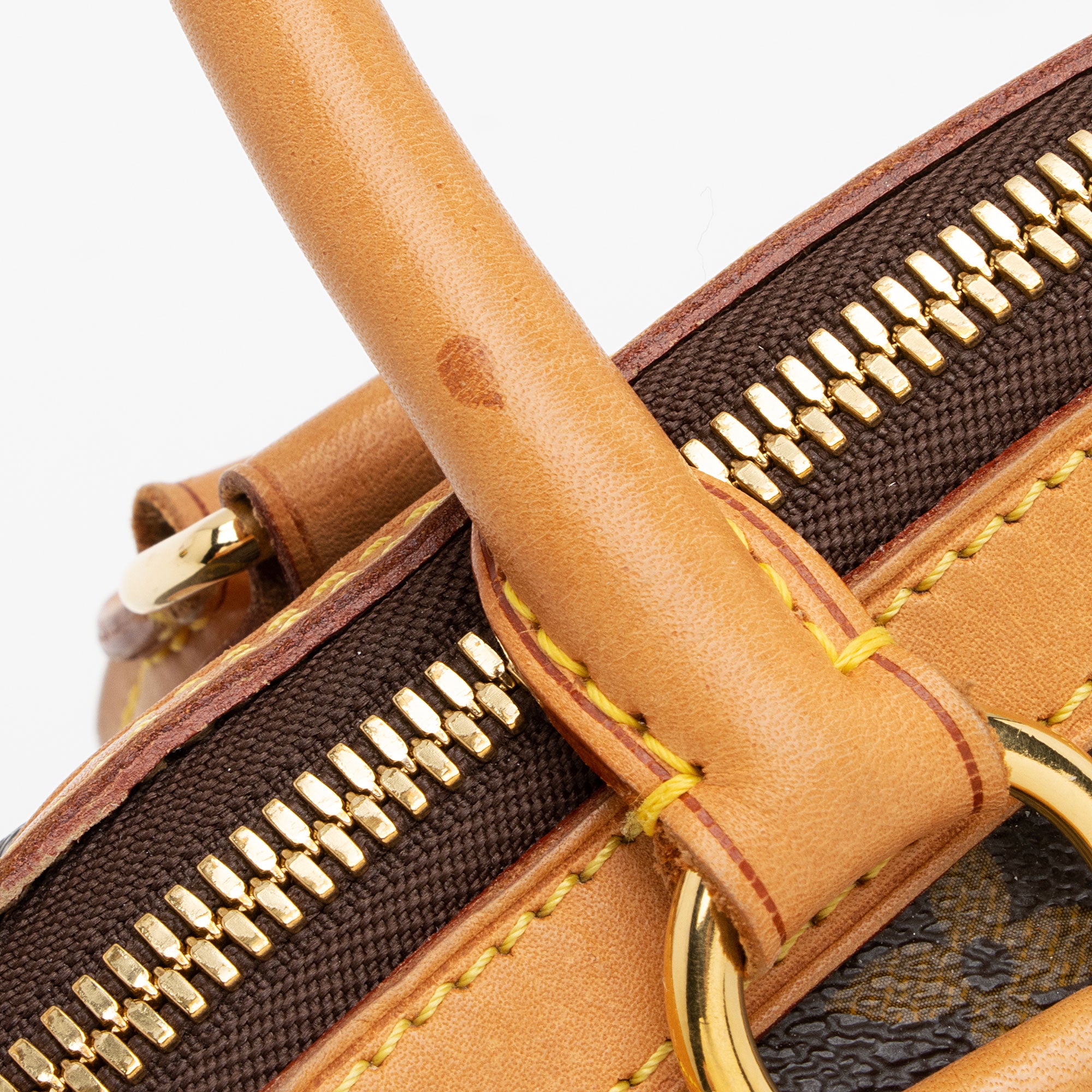 Louis Vuitton Monogram Canvas Tivoli PM Satchel (SHF-wG7YBe)