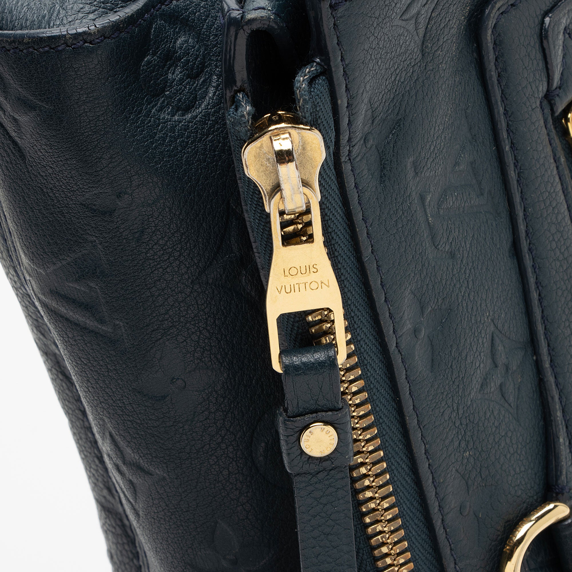 Louis Vuitton Monogram Empreinte Petillante Clutch (SHF-l9qwqD)