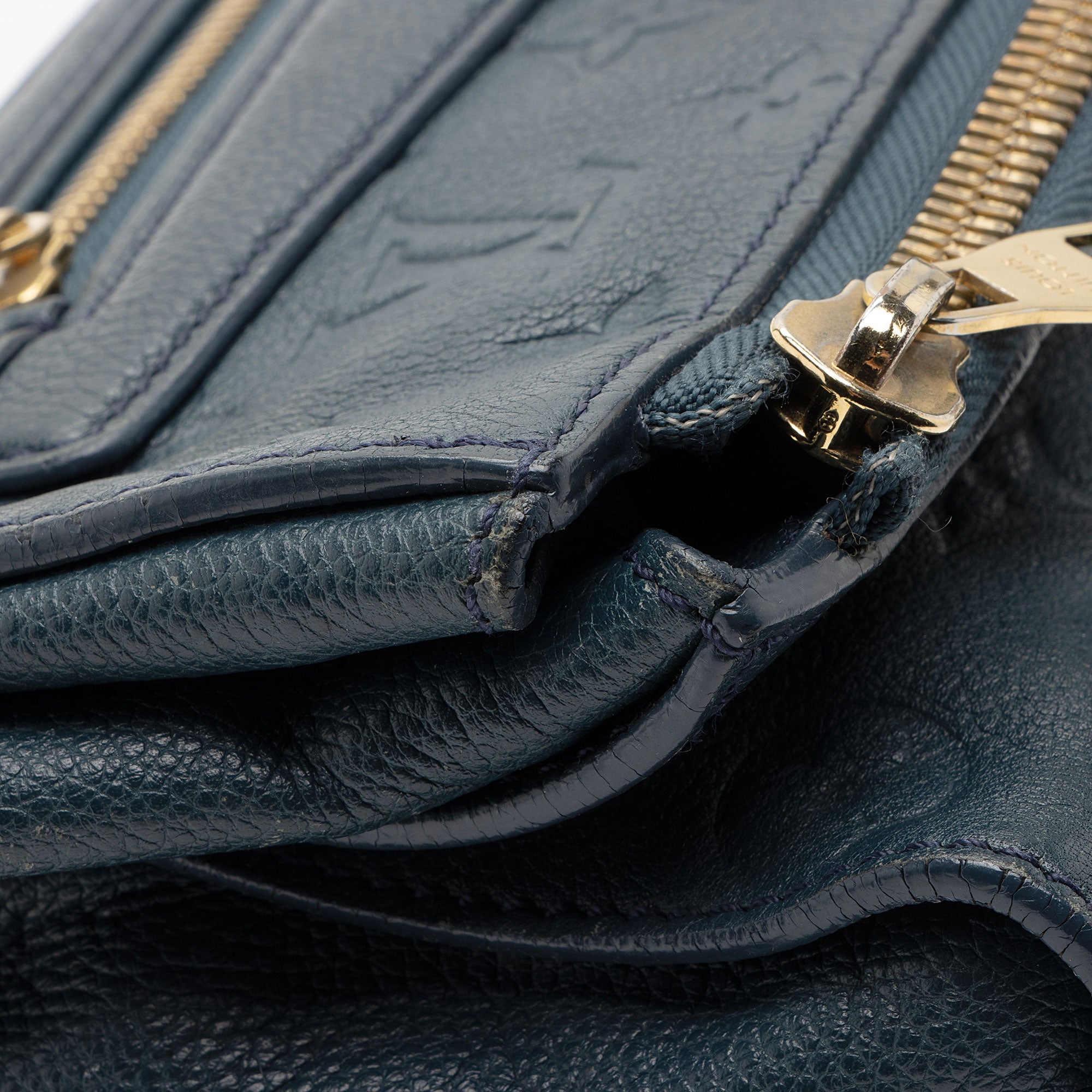 Louis Vuitton Monogram Empreinte Petillante Clutch (SHF-l9qwqD)
