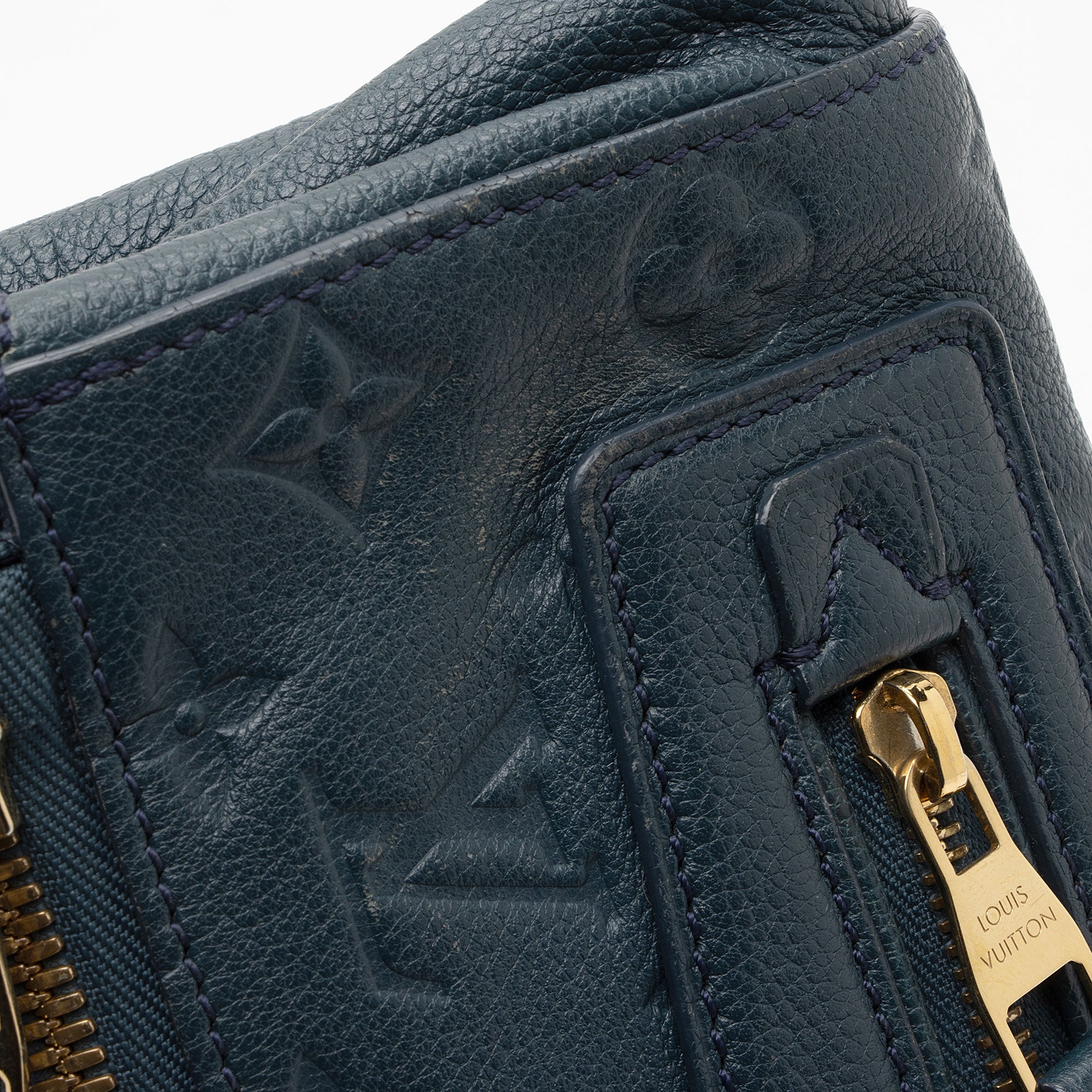 Louis Vuitton Monogram Empreinte Petillante Clutch (SHF-l9qwqD)