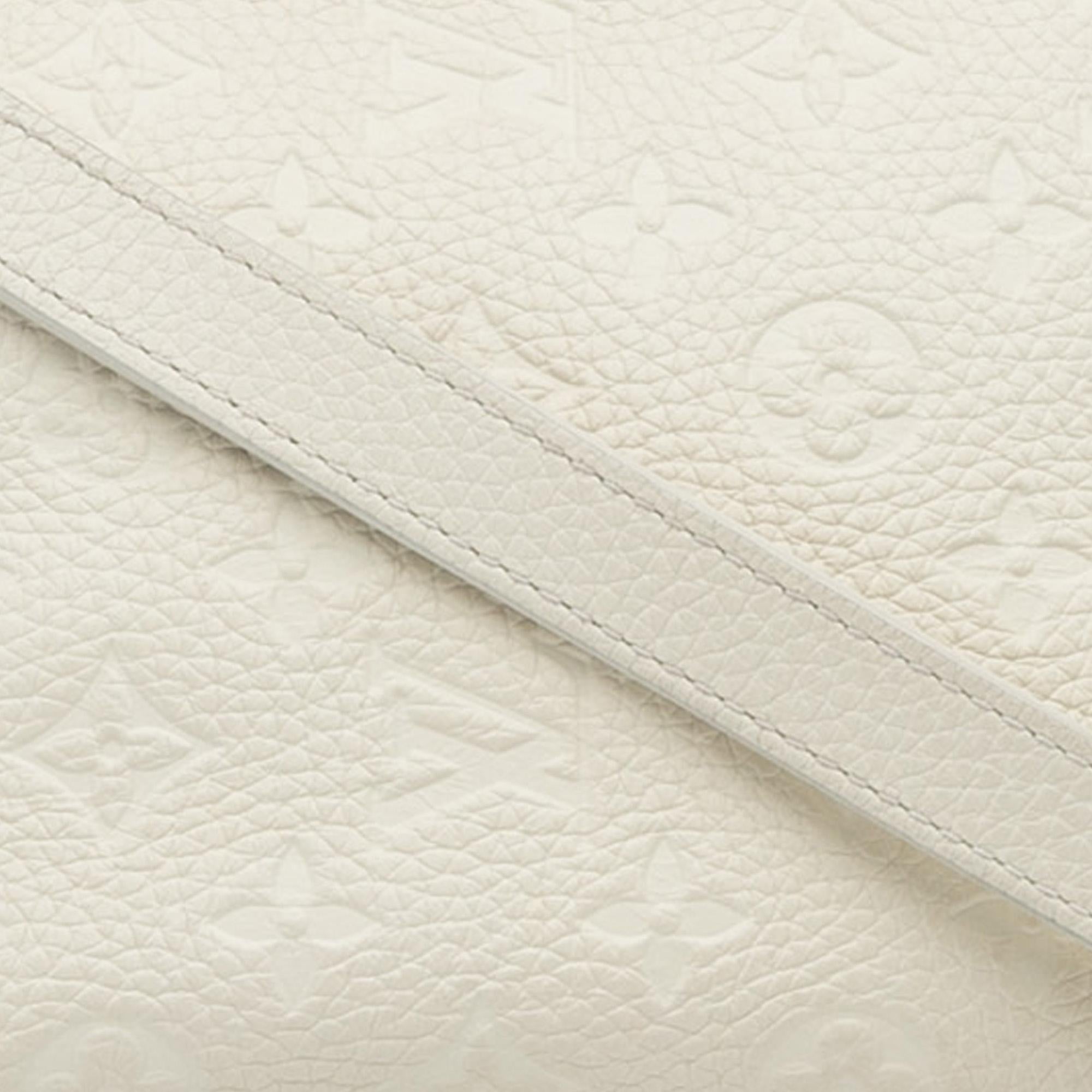 Louis Vuitton Monogram Empreinte Triangle (SHG-N0nuIO)