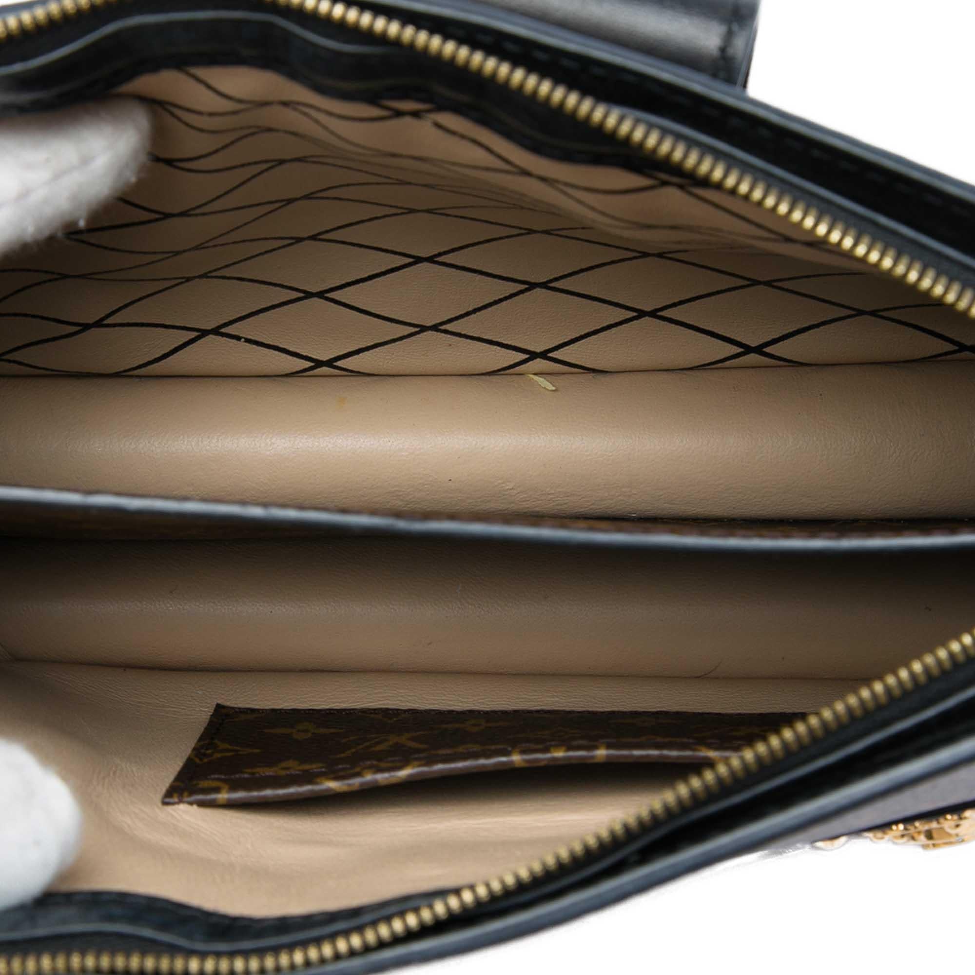 Louis Vuitton Monogram Reverse Trunk Clutch