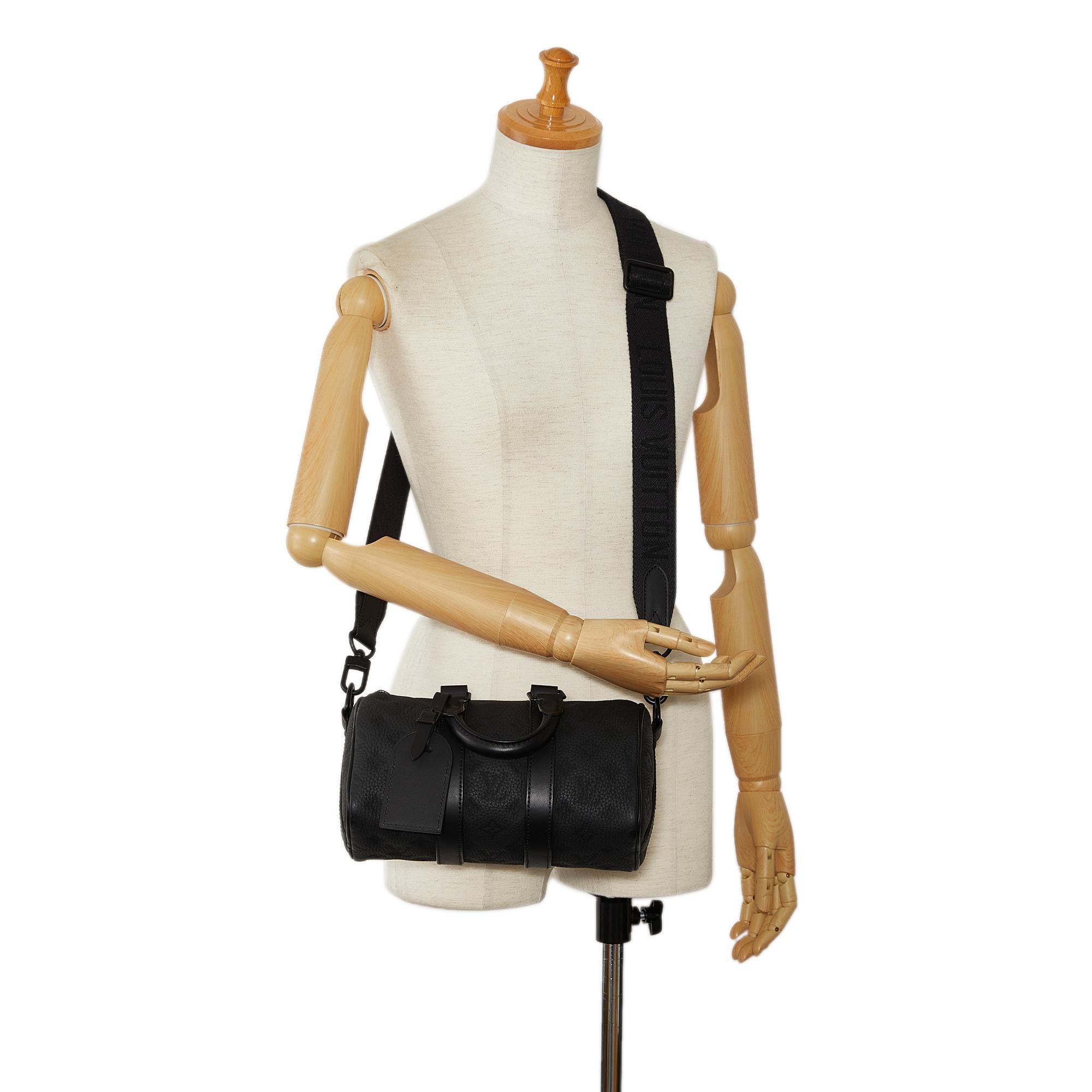 Louis Vuitton Monogram Taurillon Keepall Bandouliere 25 (SHG-ELloz4)