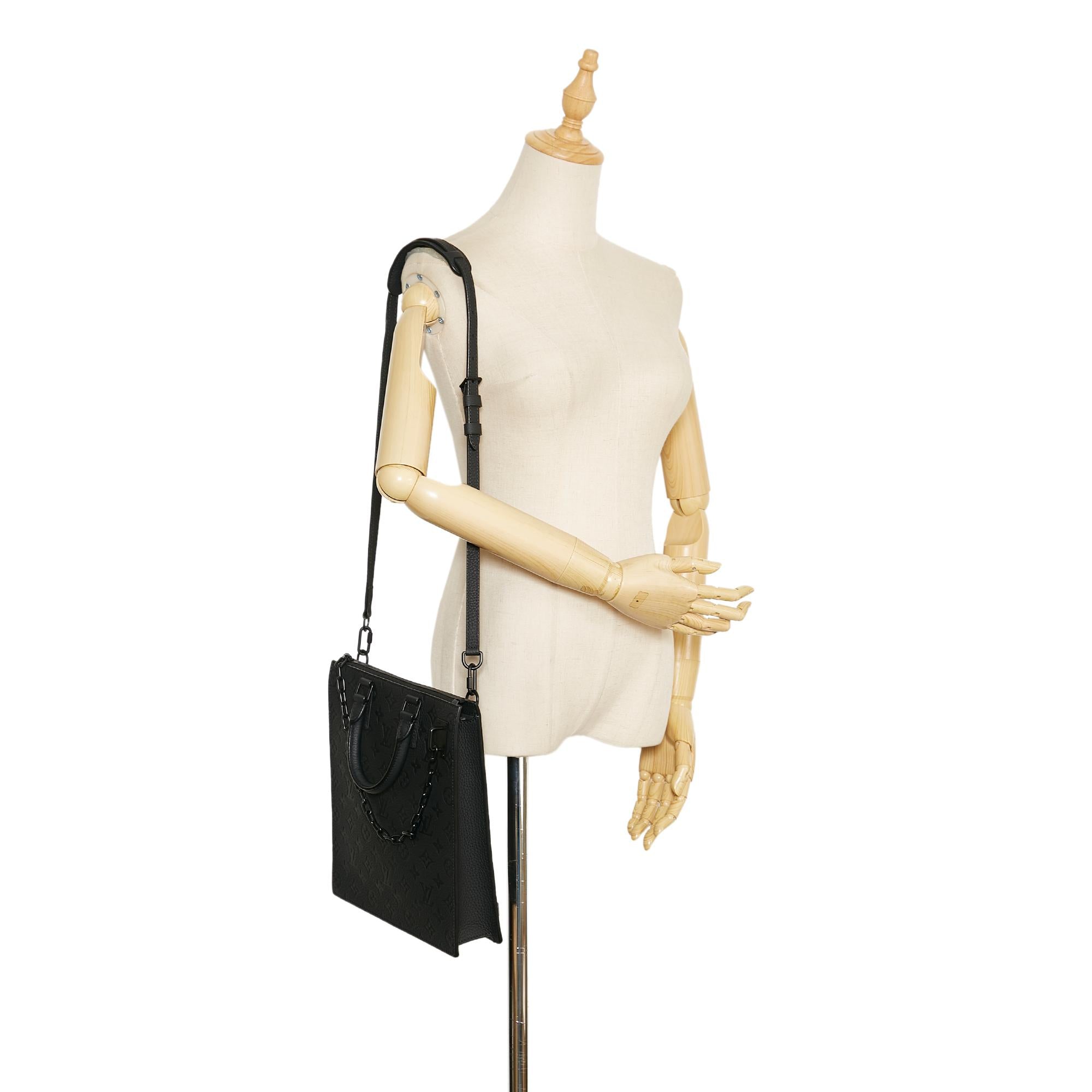 Louis Vuitton Monogram Taurillon Sac Plat (SHG-YouJrv)