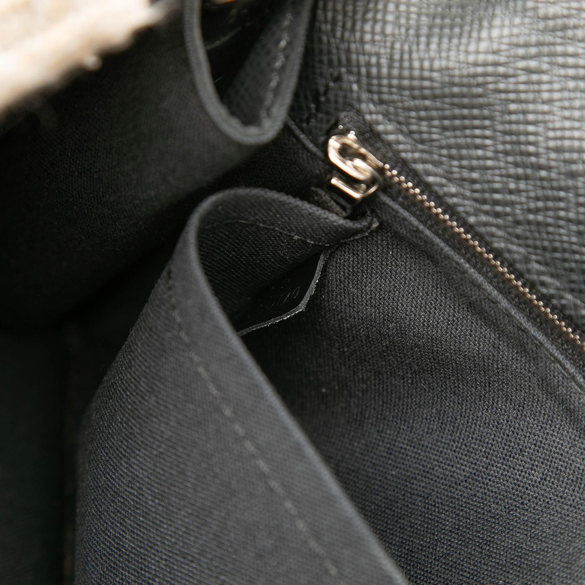 Louis Vuitton Taiga Belaia Clutch