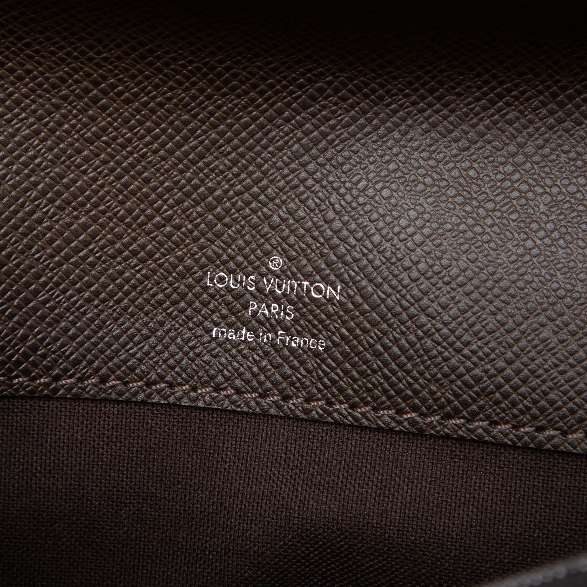 Louis Vuitton Taiga Belaia Clutch