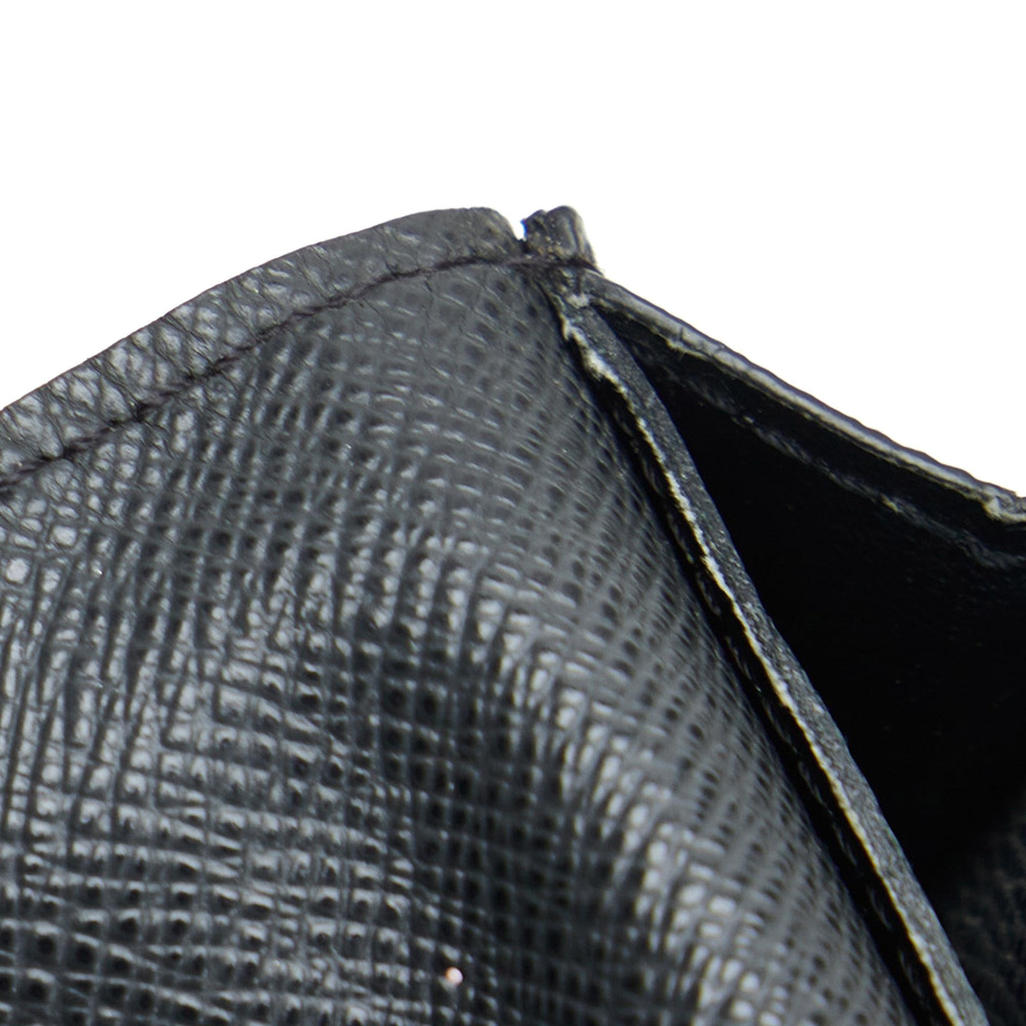 Louis Vuitton Taiga Bifold Long Wallet (SHG-AoXi4S)