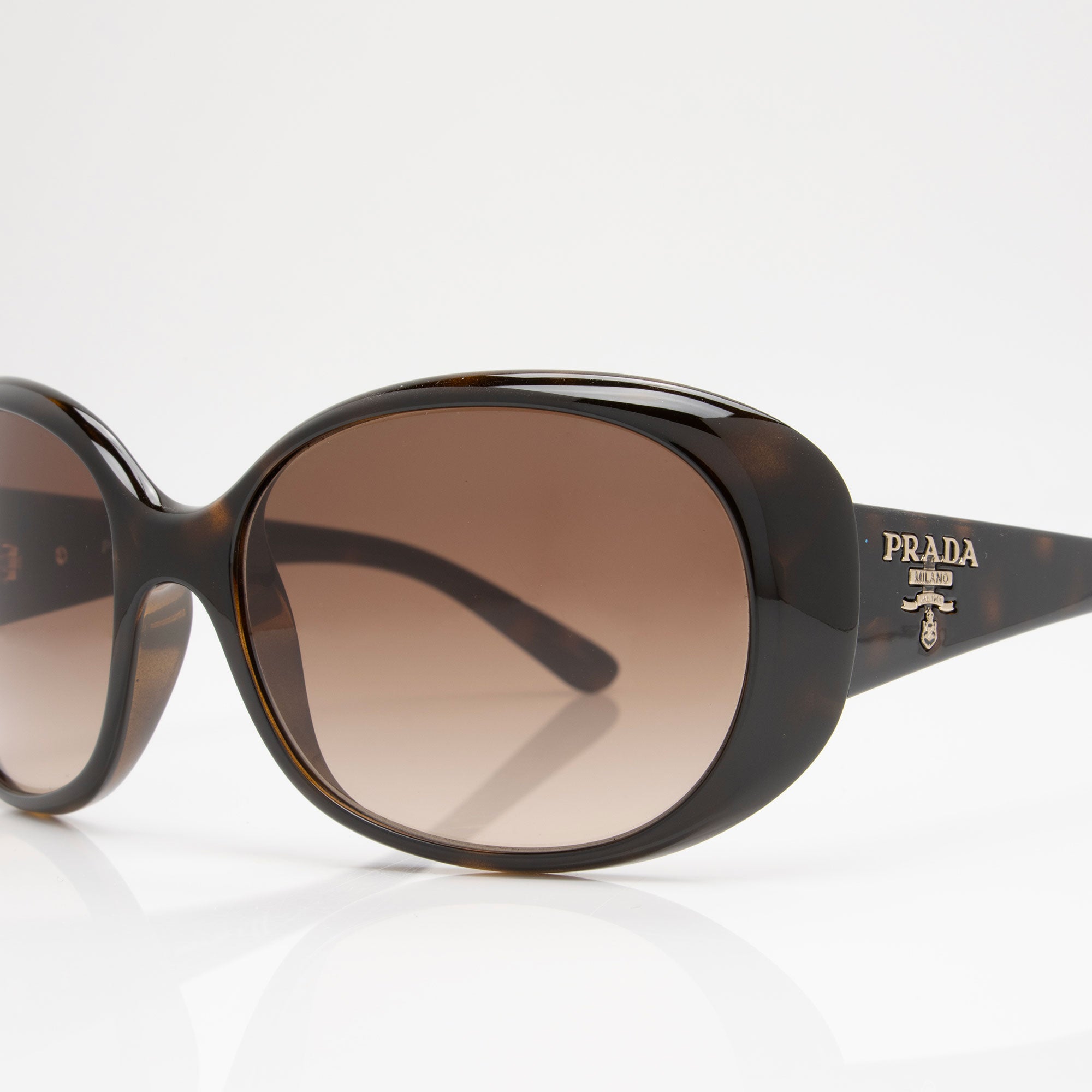 Prada Oval Sunglasses (SHF-47Cz0y)