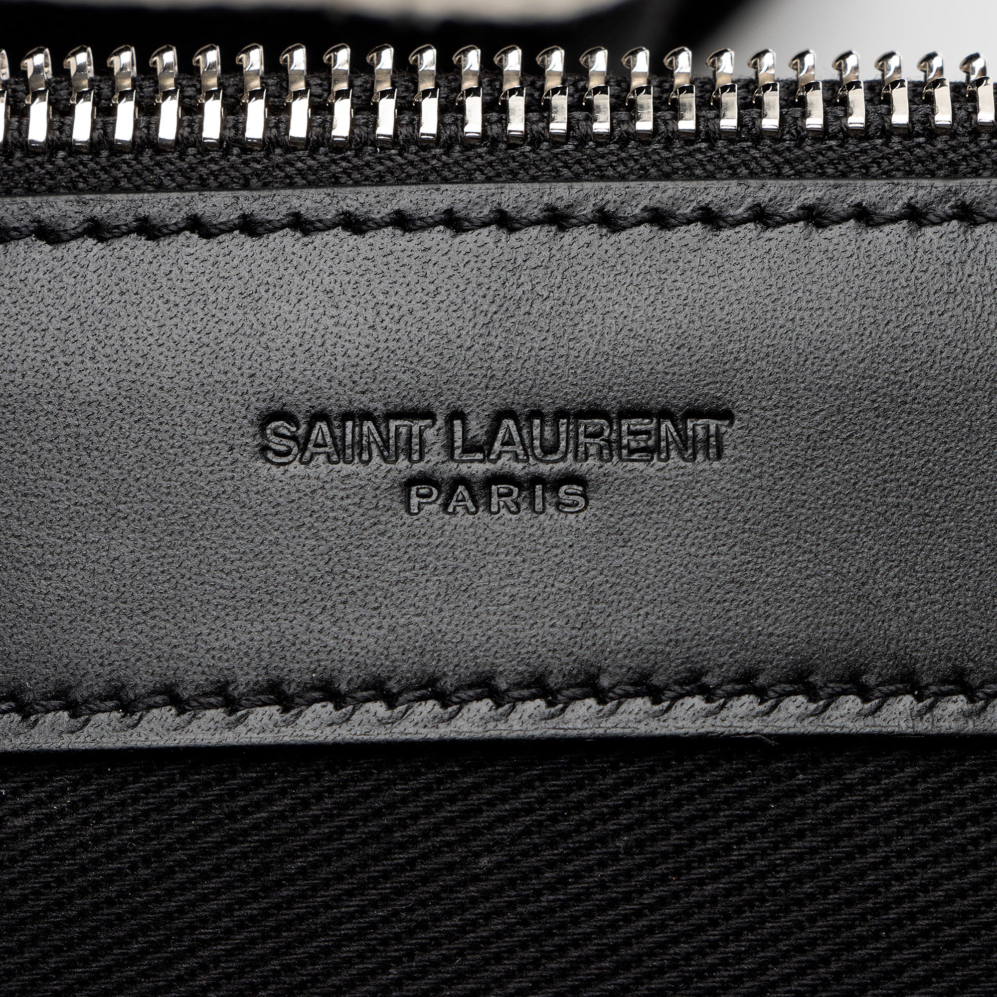Saint Laurent Canvas Embroidered Rive Gauche Drawstring Sling Bag