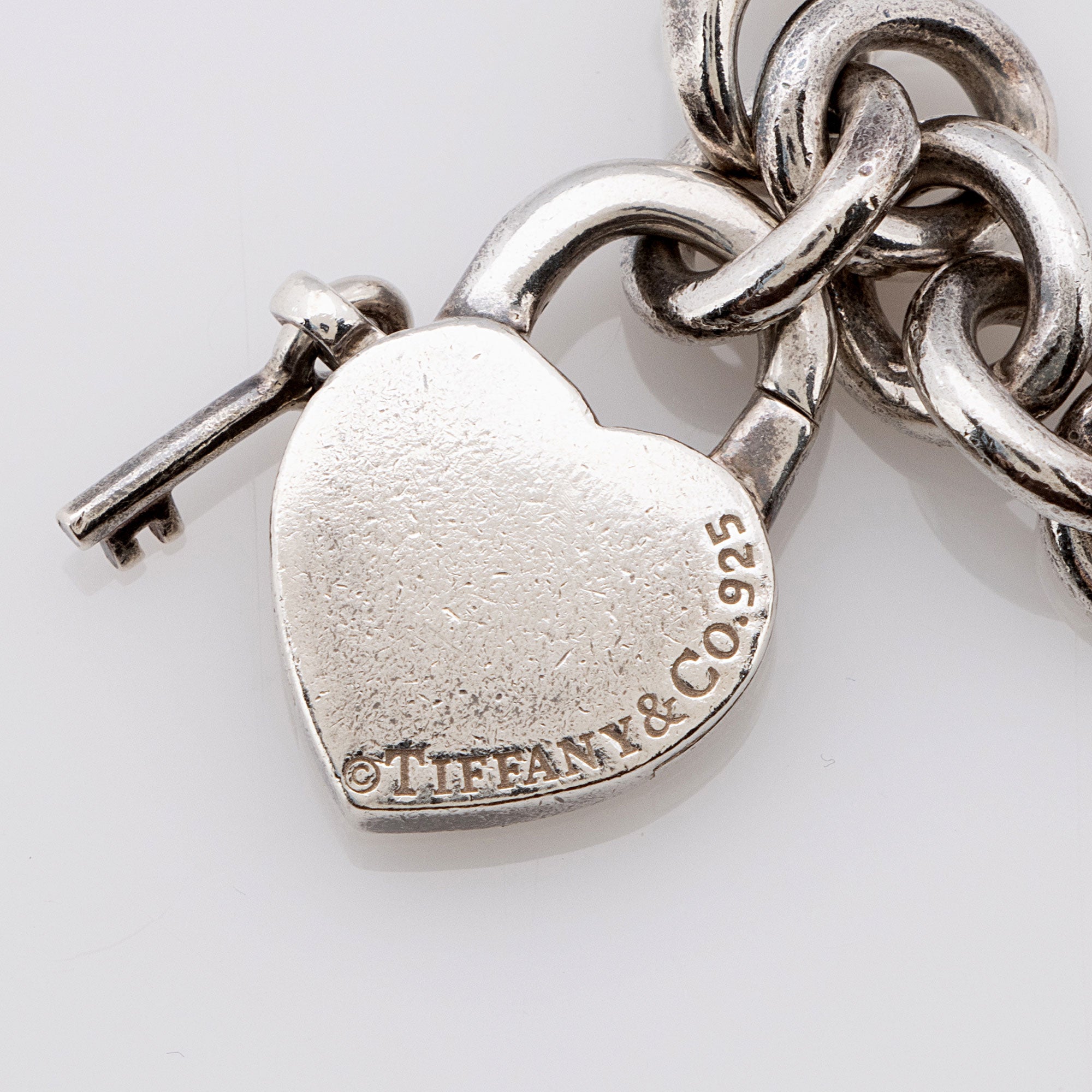 Tiffany & Co. Sterling Silver Heart Padlock Key Lever Charm Bracelet (SHF-y6ppVE)