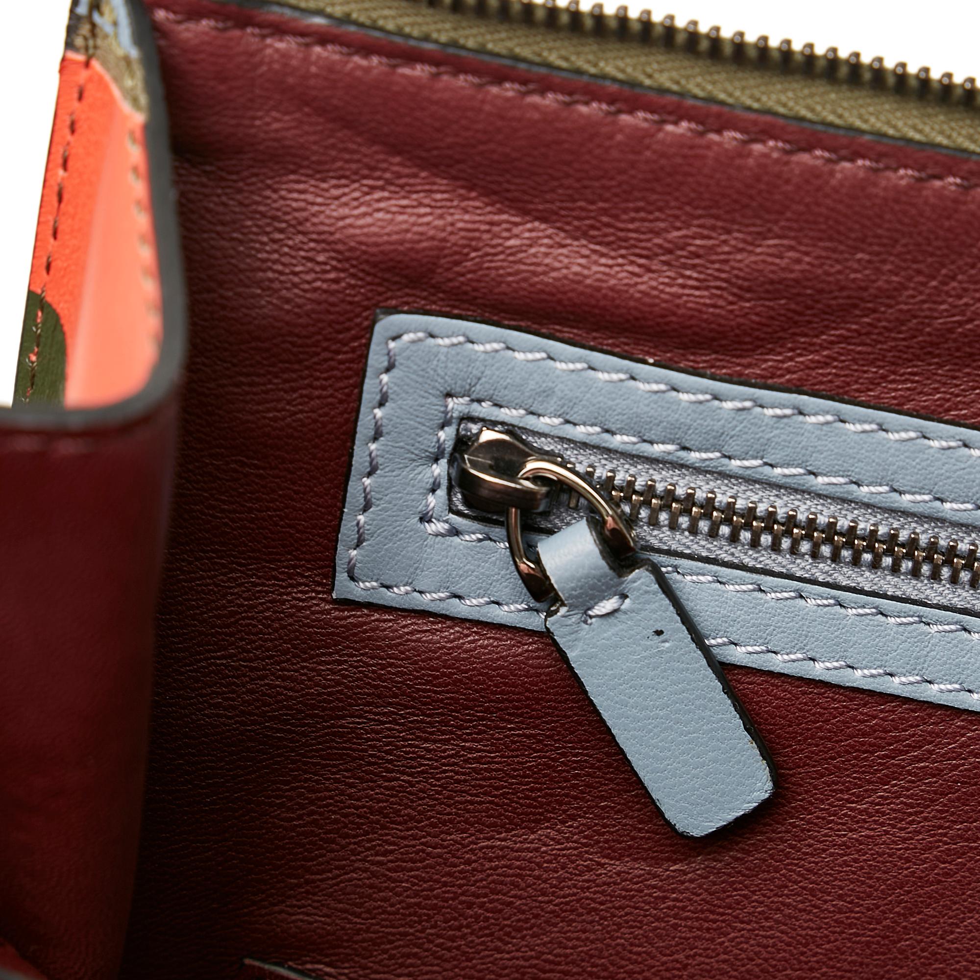 Valentino Camouflage Canvas and Leather Clutch Bag (SHG-RYK6ji)