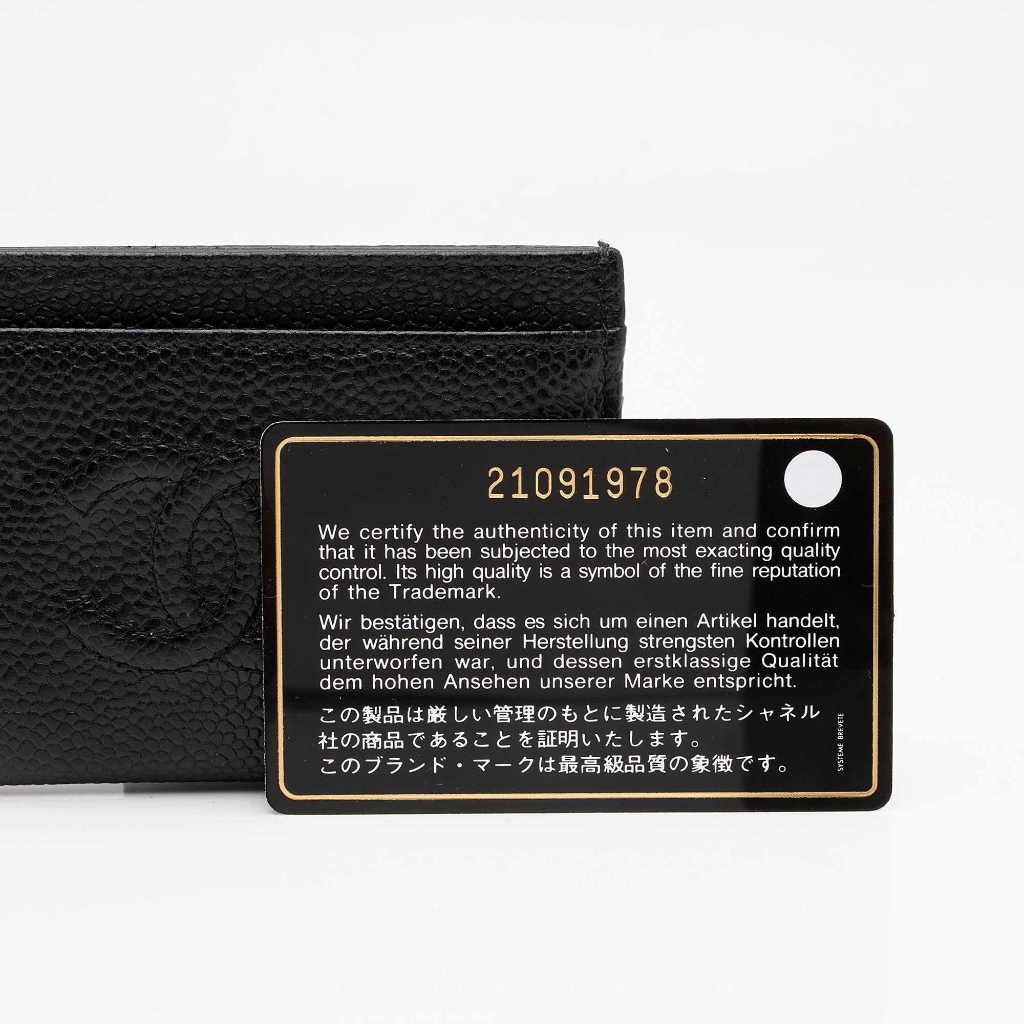Chanel Caviar Leather Timeless CC Card Holder (SHF-RcPyJg)