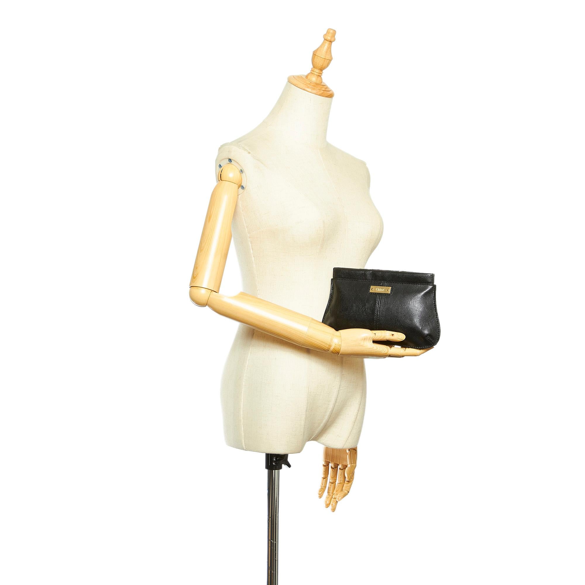 Chloe Embossed Leather Clutch (SHG-22267)