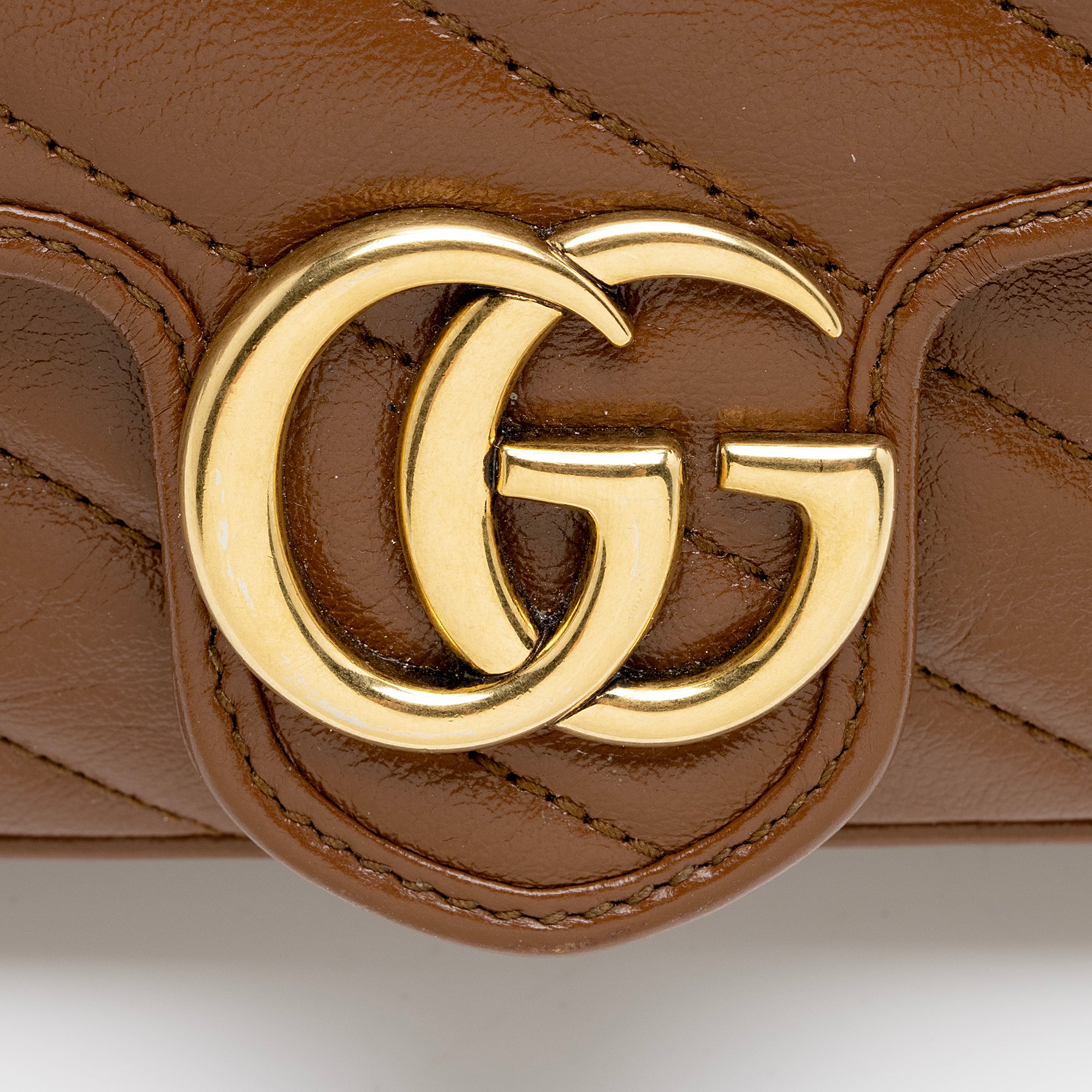 Gucci Matelasse Leather GG Marmont Super Mini Bag (SHF-E9ZcFF)