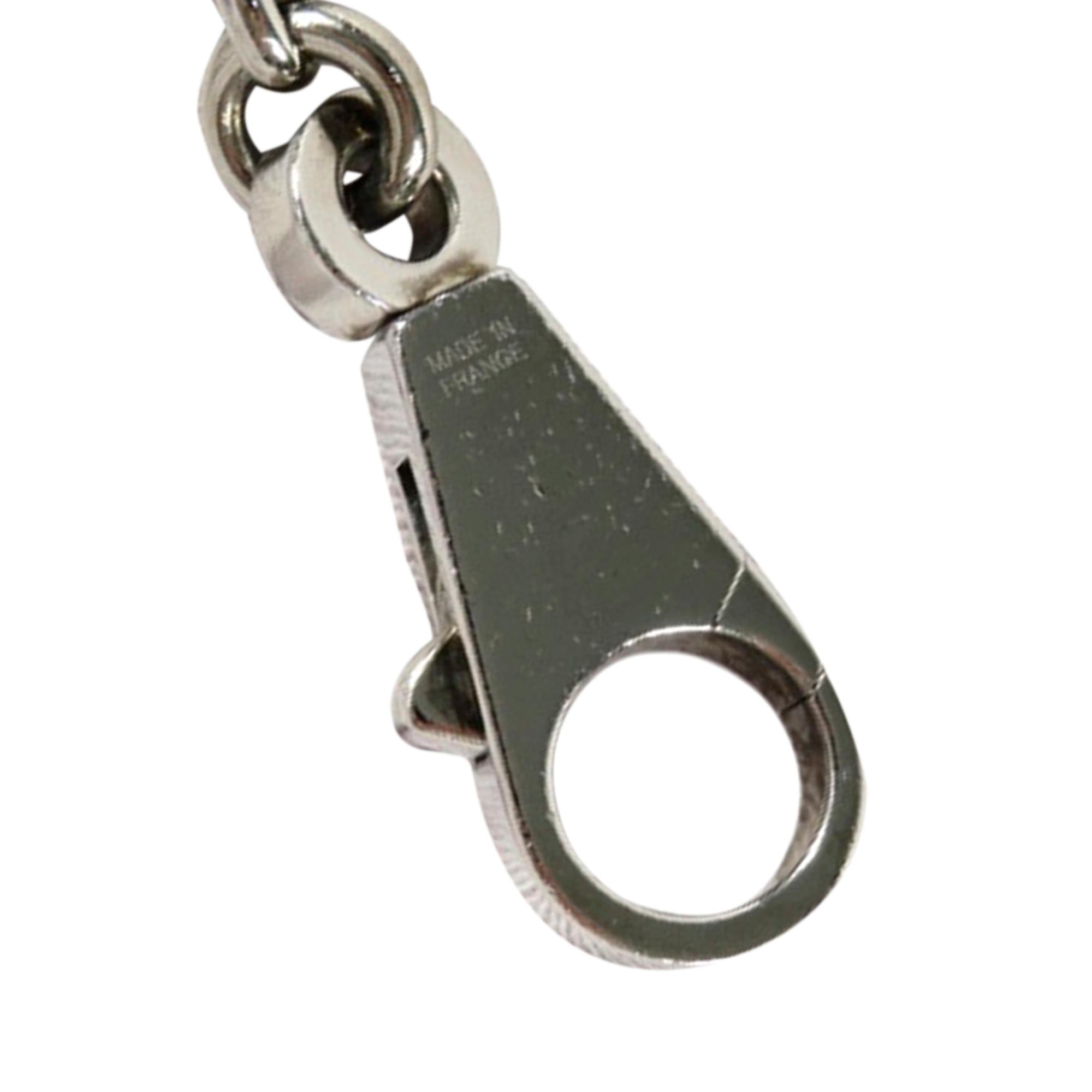 Hermes Olga Breloque Palladium and Leather Bag Charm (SHG-36999)