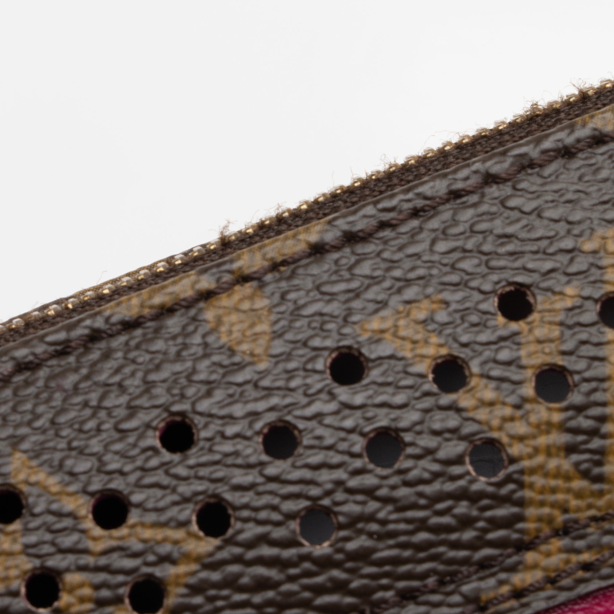 Louis Vuitton Limited Edition Monogram Canvas Perforated Pochette (SHF-22741)