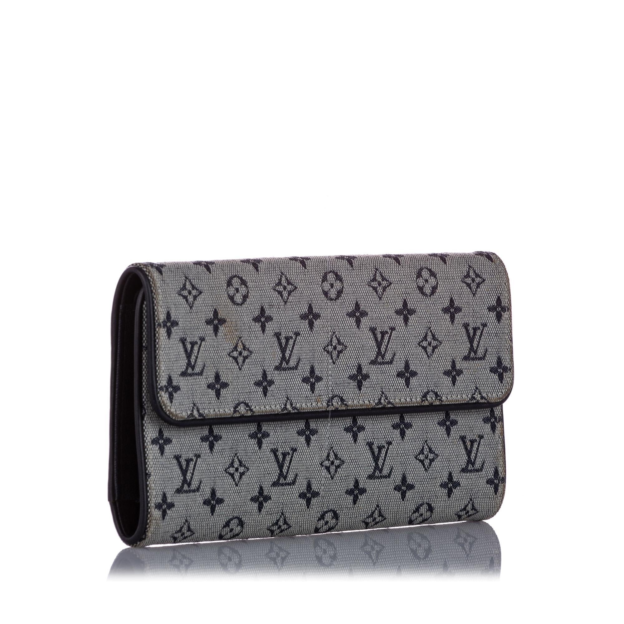 Louis Vuitton Monogram Mini Lin Porte Tresor International Wallet (SHG-37823)