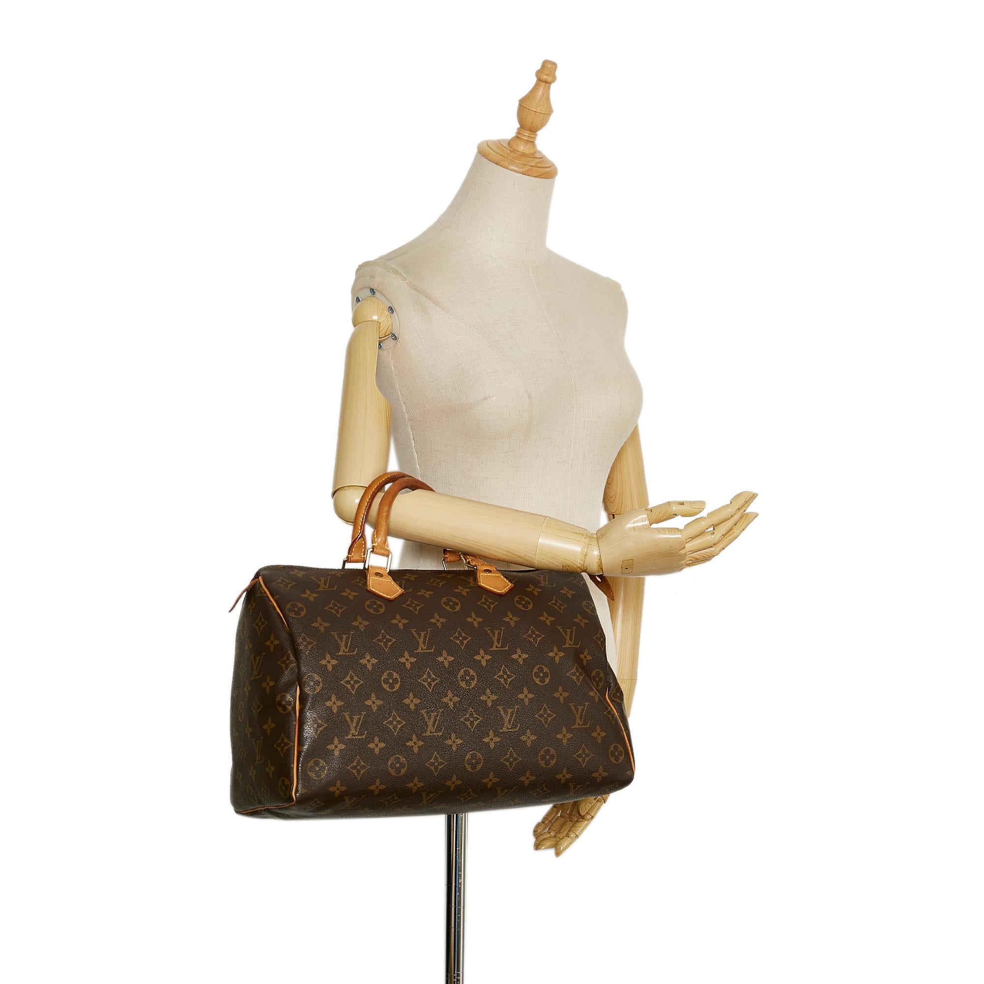 Louis Vuitton Monogram Speedy 35 (SHG-mcNS9U)